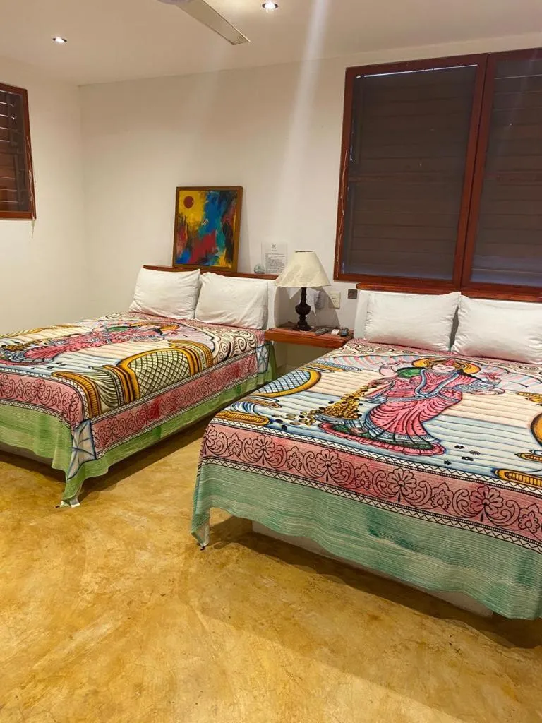 Bed in Casa de las Olas Surf & Beach Club