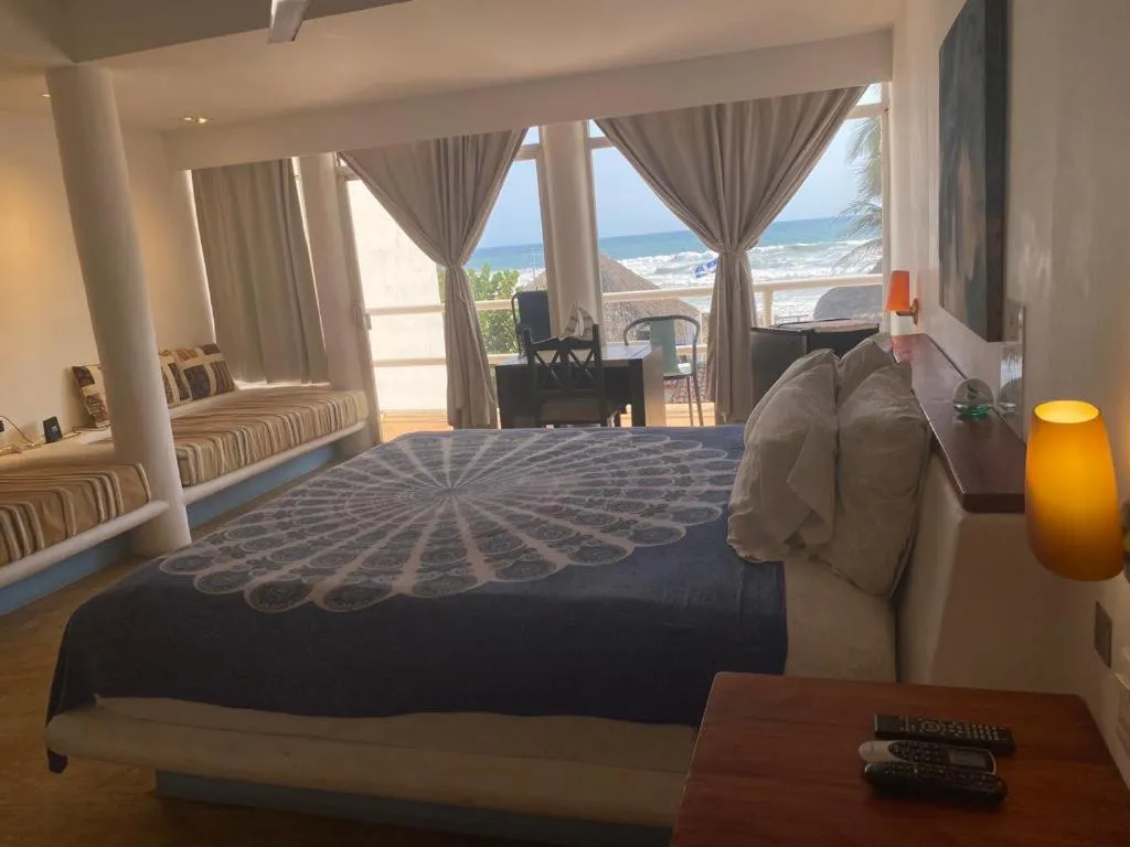Bed in Casa de las Olas Surf & Beach Club