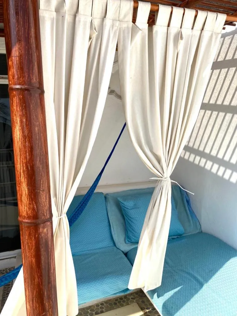 Bed in Casa de las Olas Surf & Beach Club