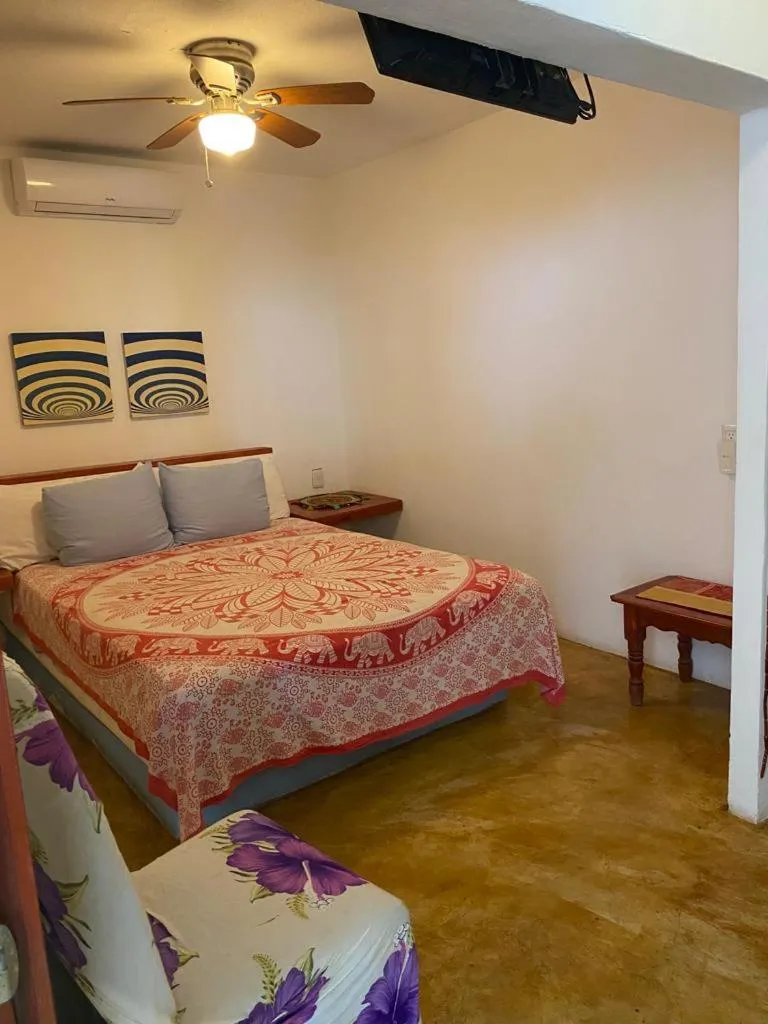 Bed in Casa de las Olas Surf & Beach Club