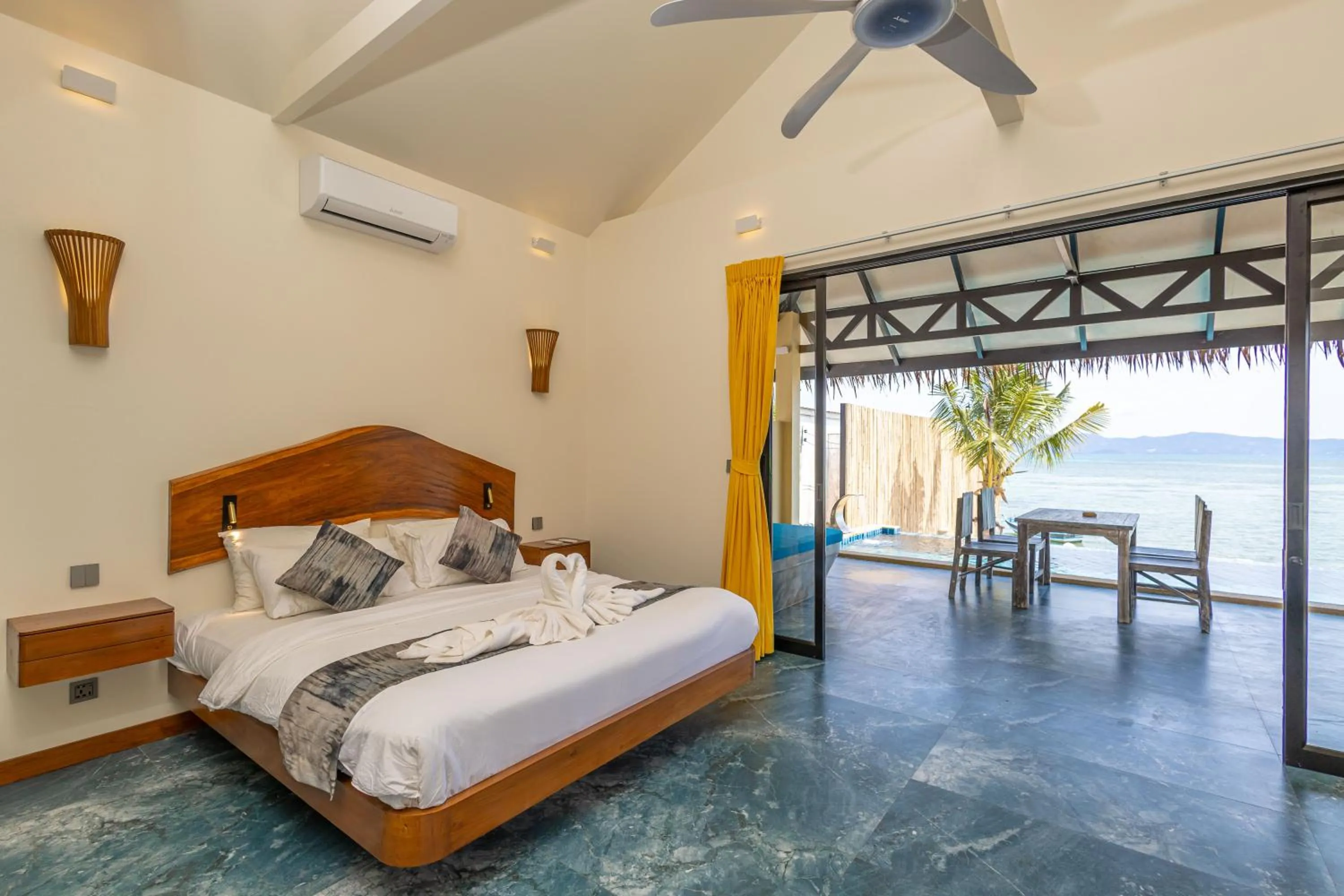 Bed in Absolute Beachfront Resort