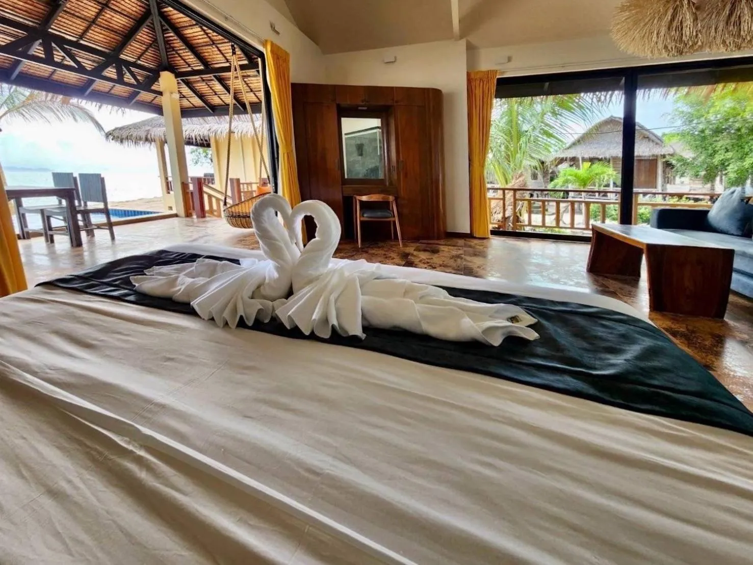 Photo of the whole room, Bed in Absolute Beachfront Resort