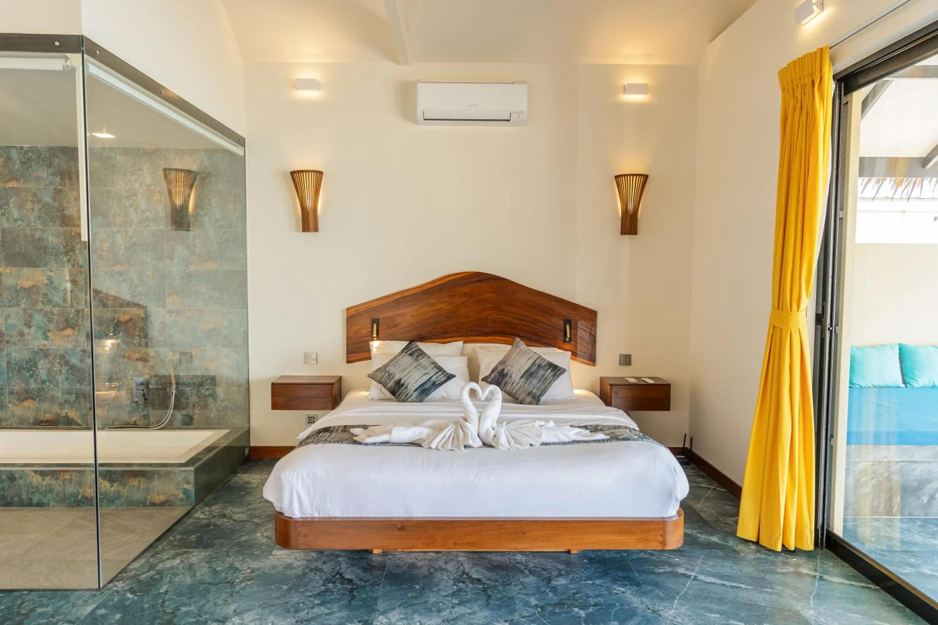 Bed in Absolute Beachfront Resort