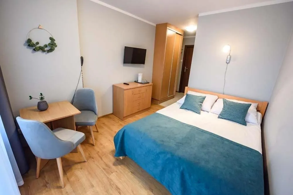 Photo of the whole room, Bed in Ośrodek Szkoleniowo Wypoczynkowy Galicya