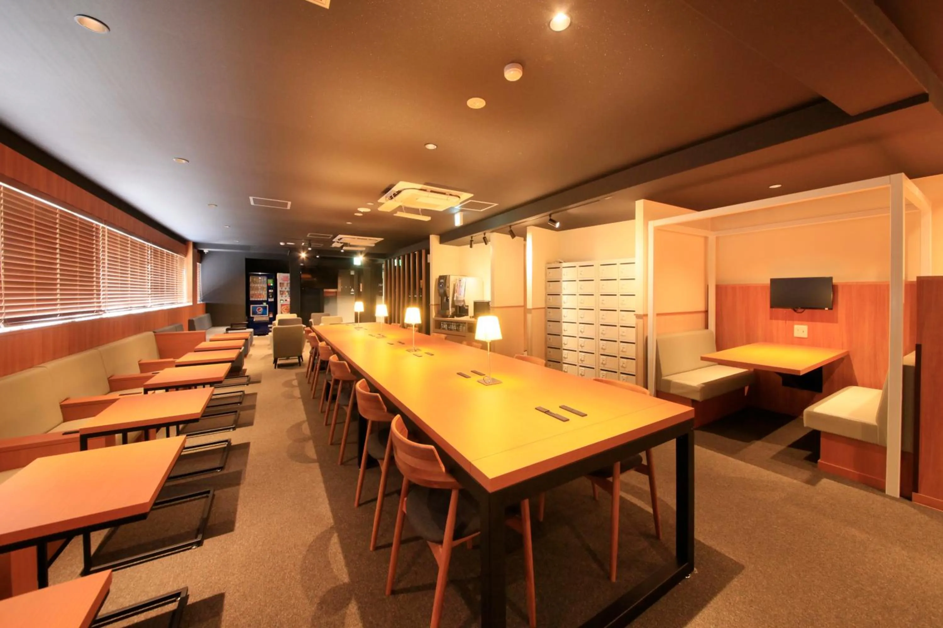 Communal lounge/ TV room in Tabist CapsuleHotel APODS Himeji Station