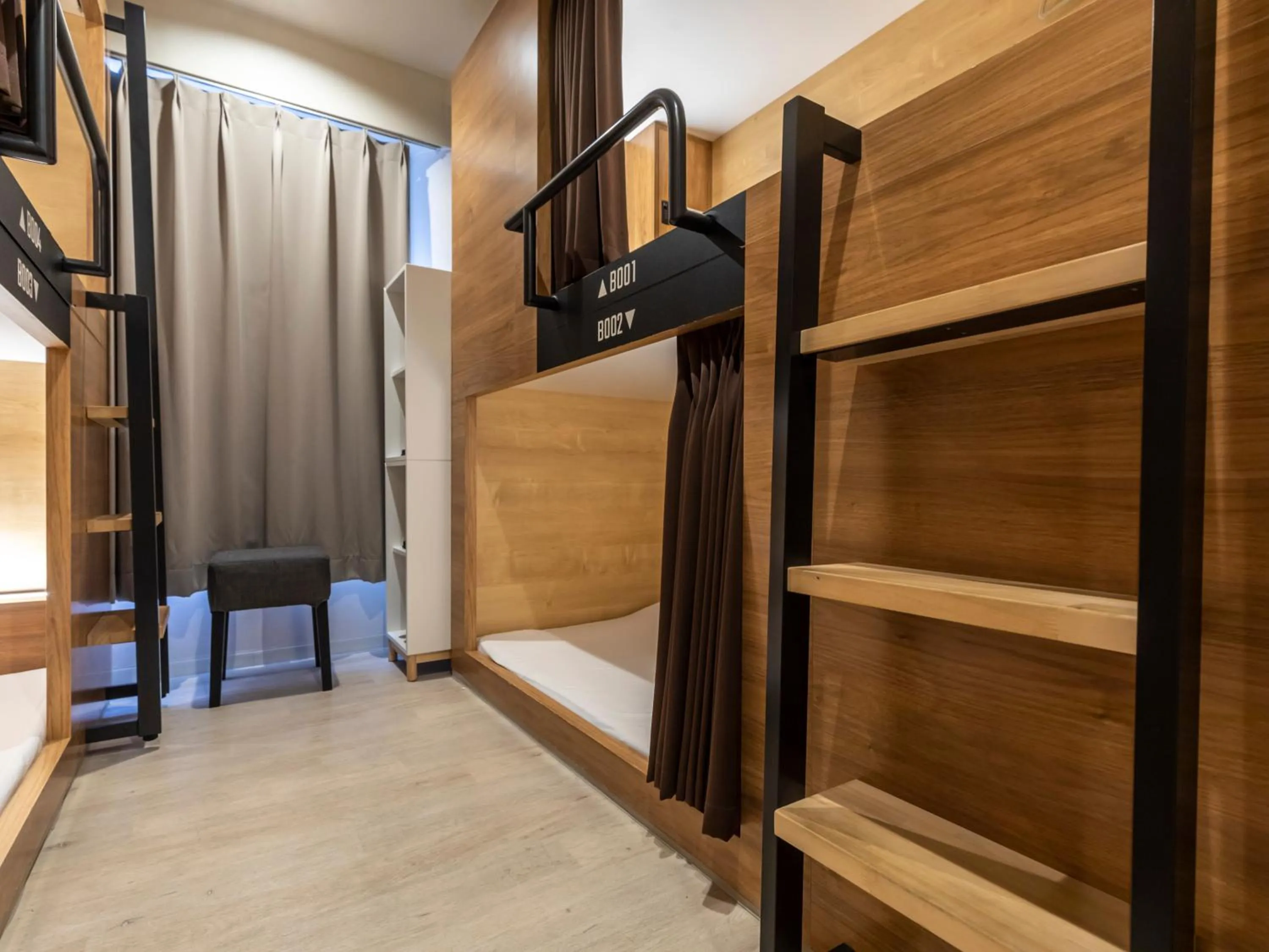 Bed in Tabist CapsuleHotel APODS Himeji Station