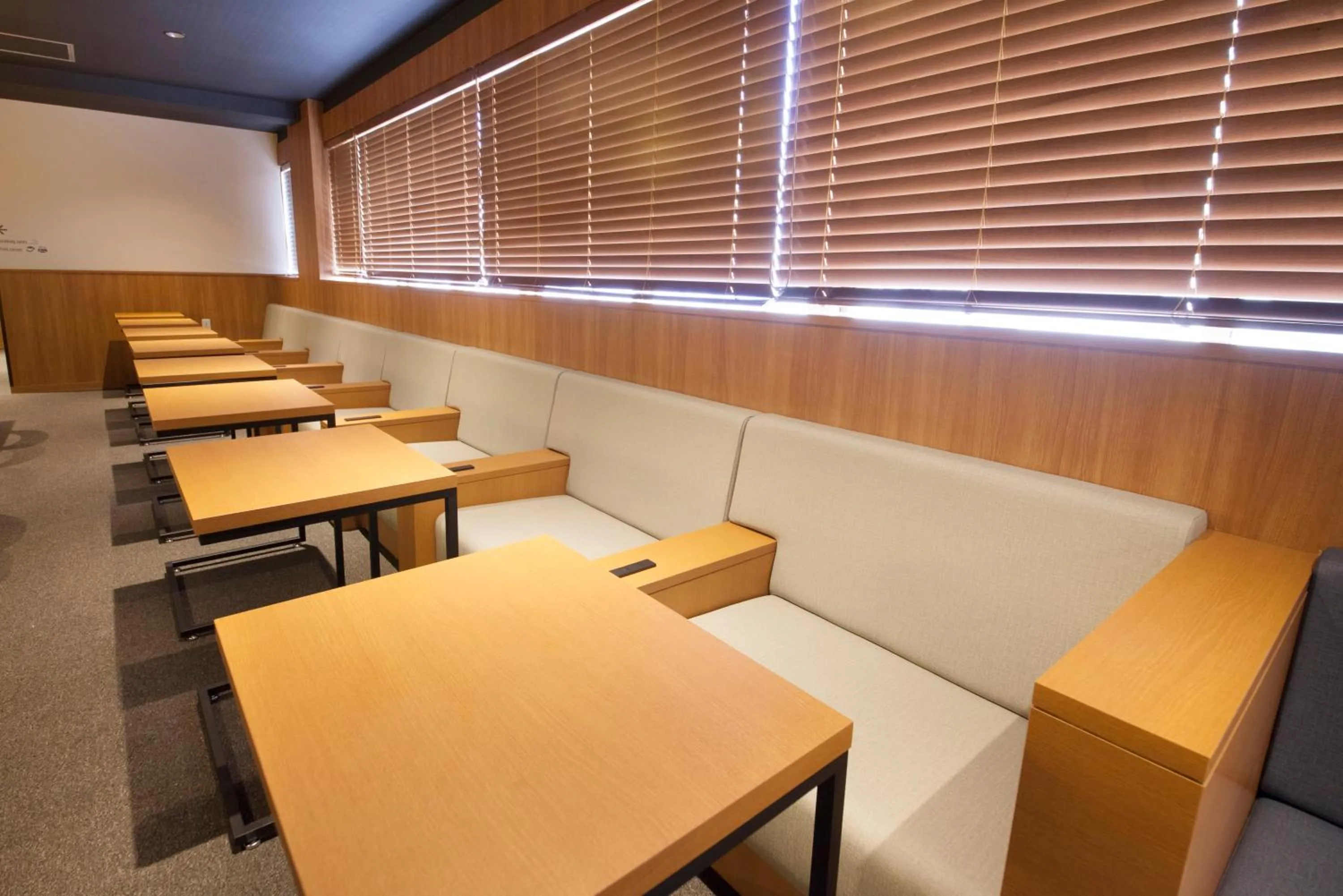 Communal lounge/ TV room in Tabist CapsuleHotel APODS Himeji Station