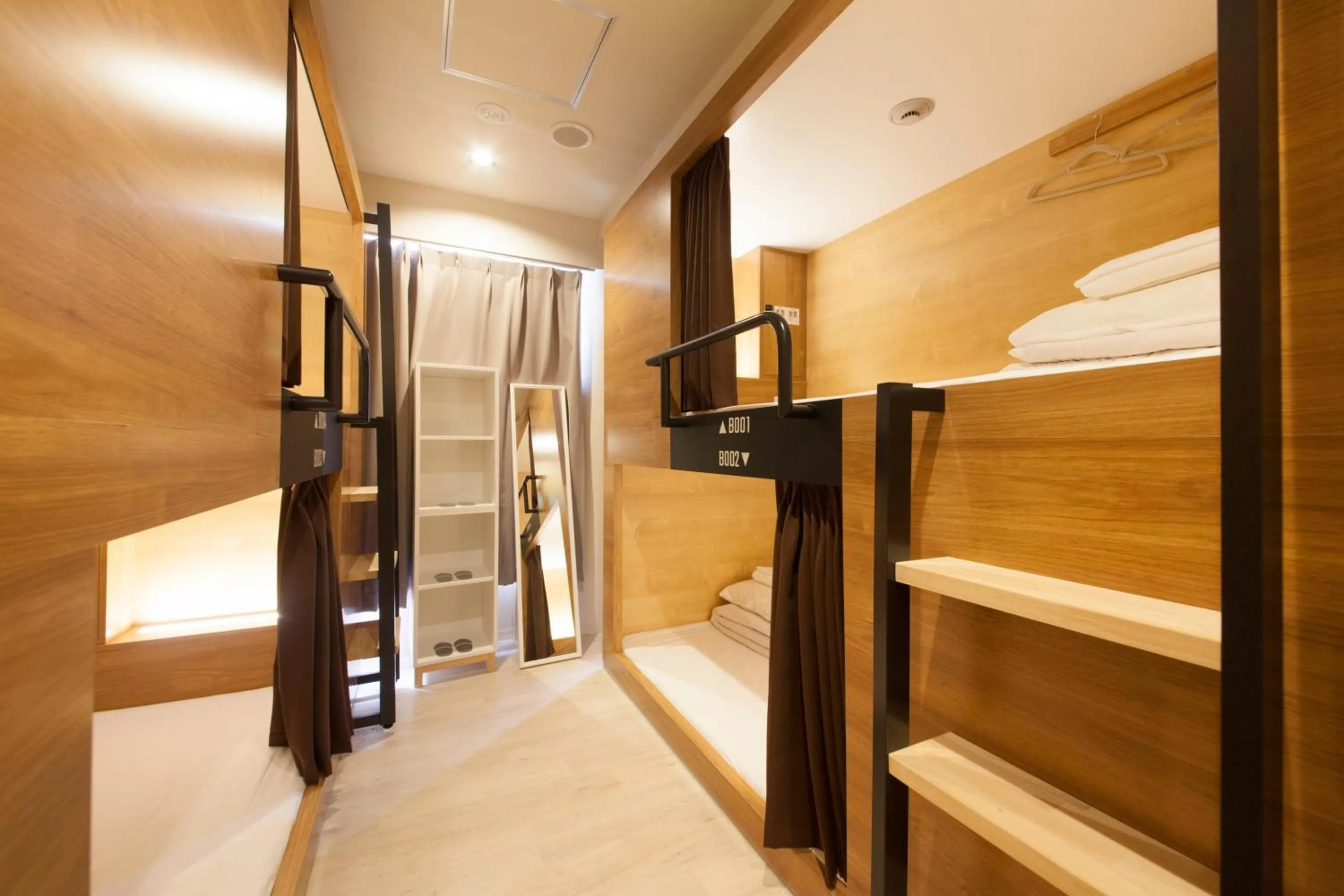 Bed in Tabist CapsuleHotel APODS Himeji Station