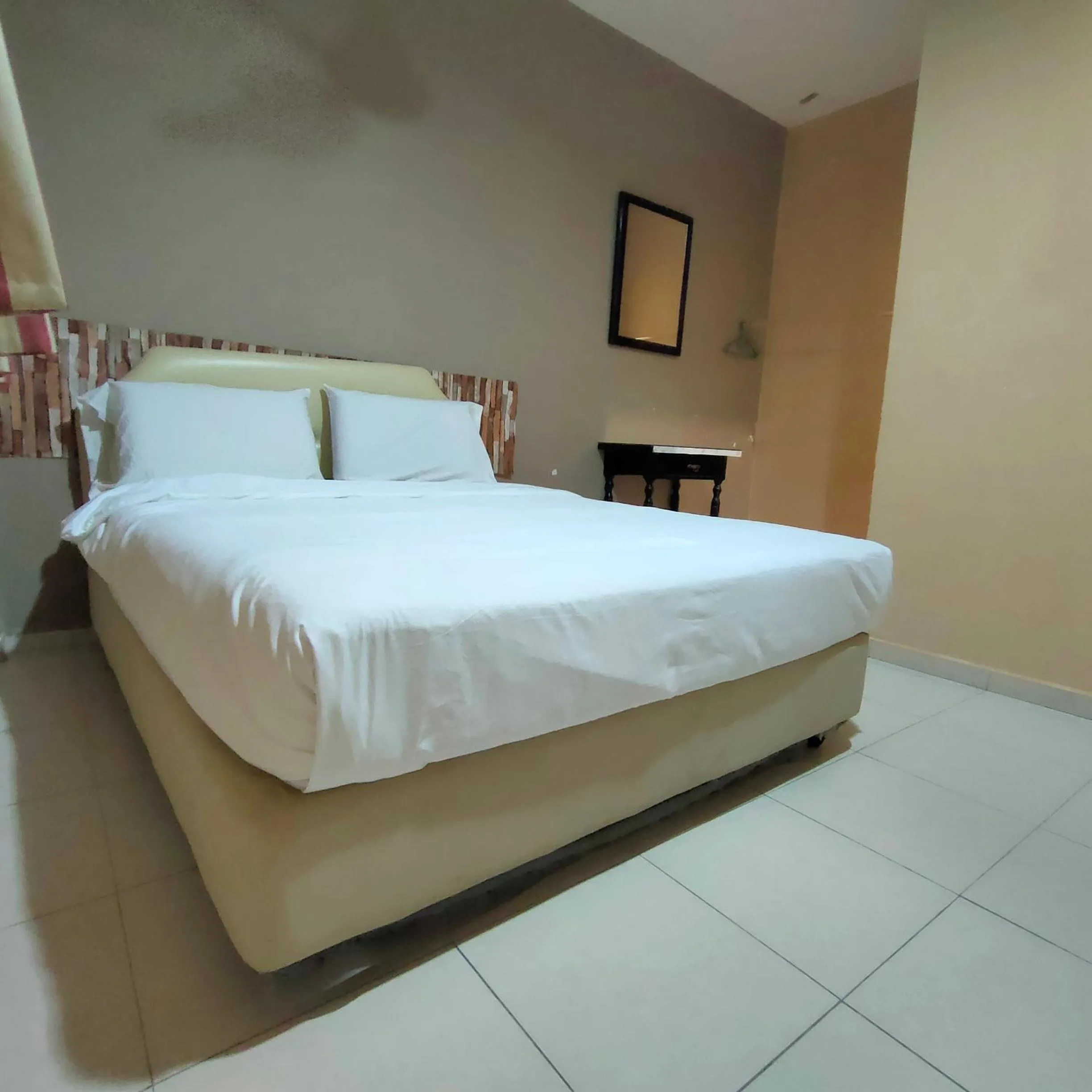 Bed in Kota Lodge Guest House