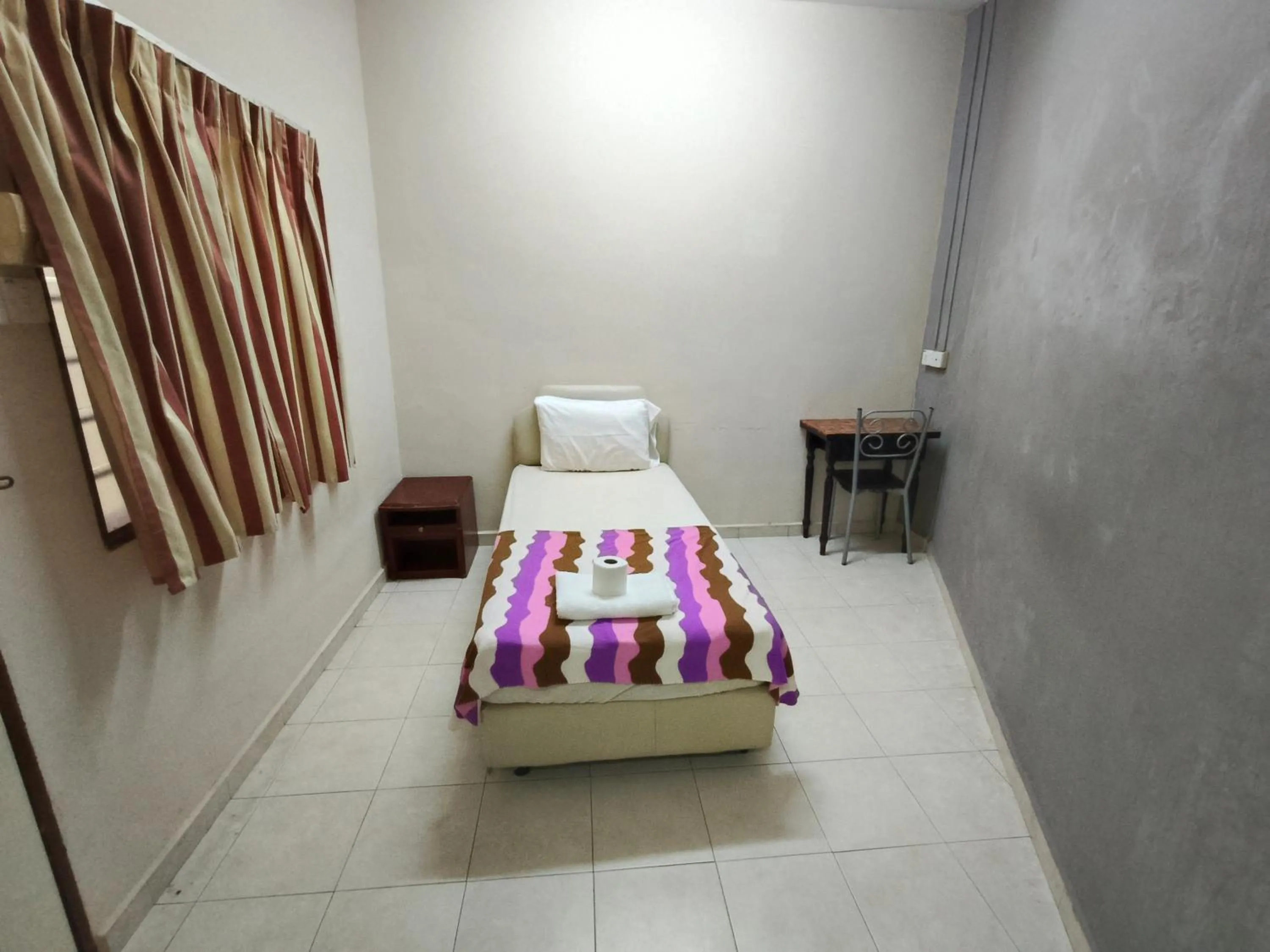 Bed in Kota Lodge Guest House