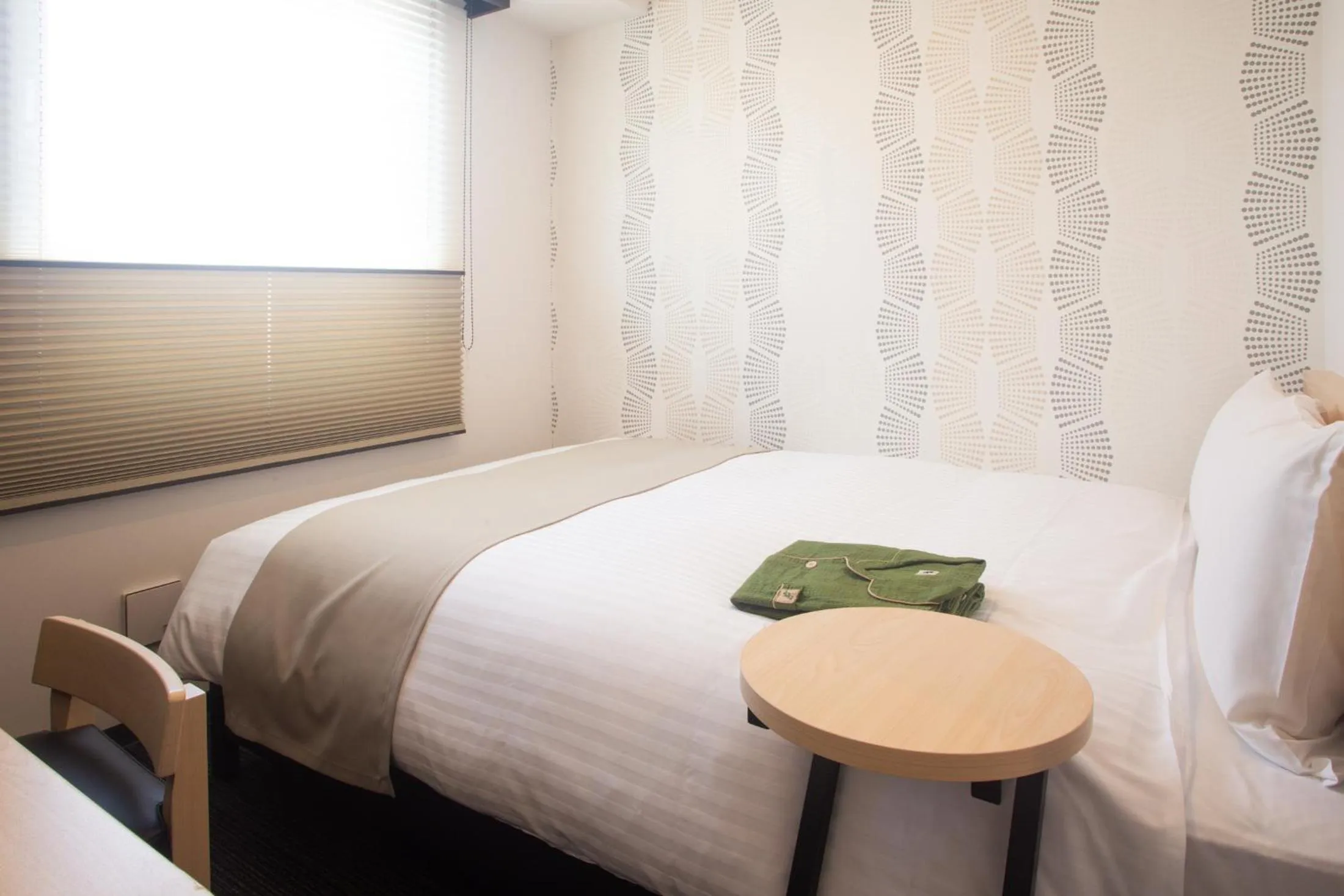 Bed in Hotel Kuretakeso Hiroshima Otemachi