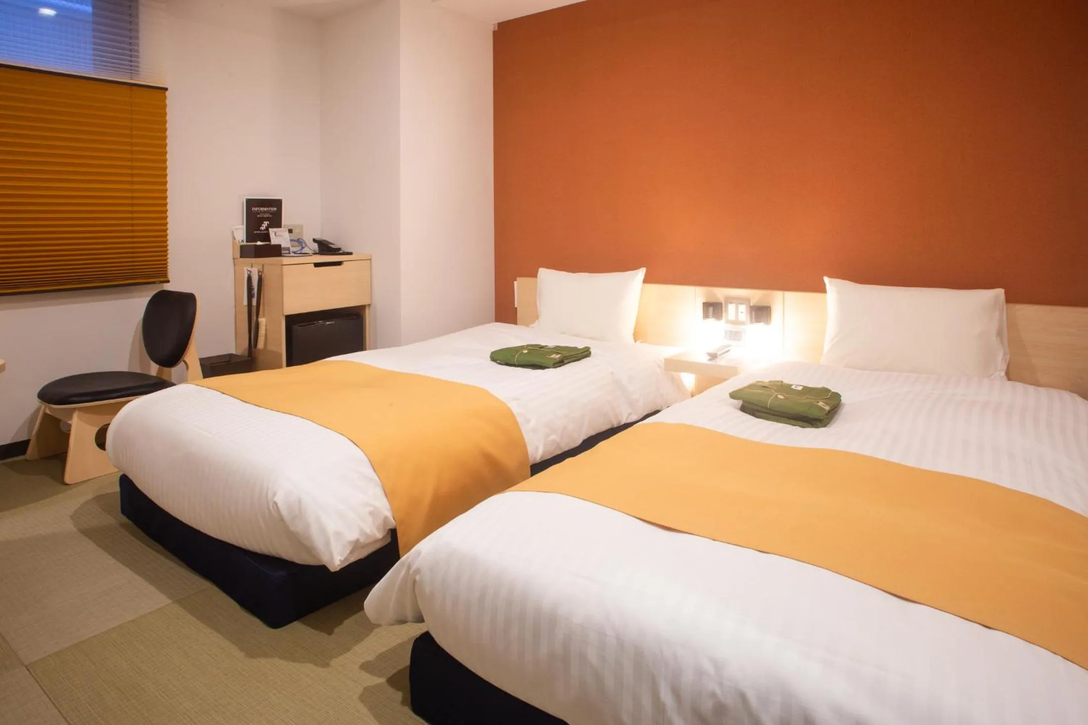 Bed in Hotel Kuretakeso Hiroshima Otemachi