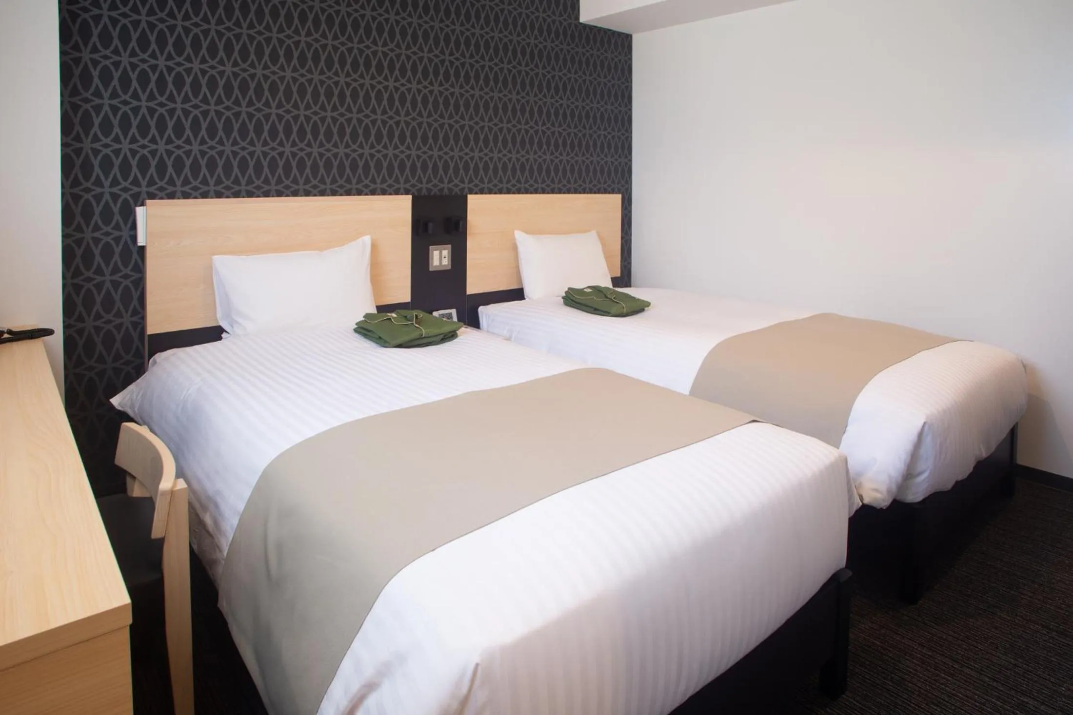 Bed in Hotel Kuretakeso Hiroshima Otemachi