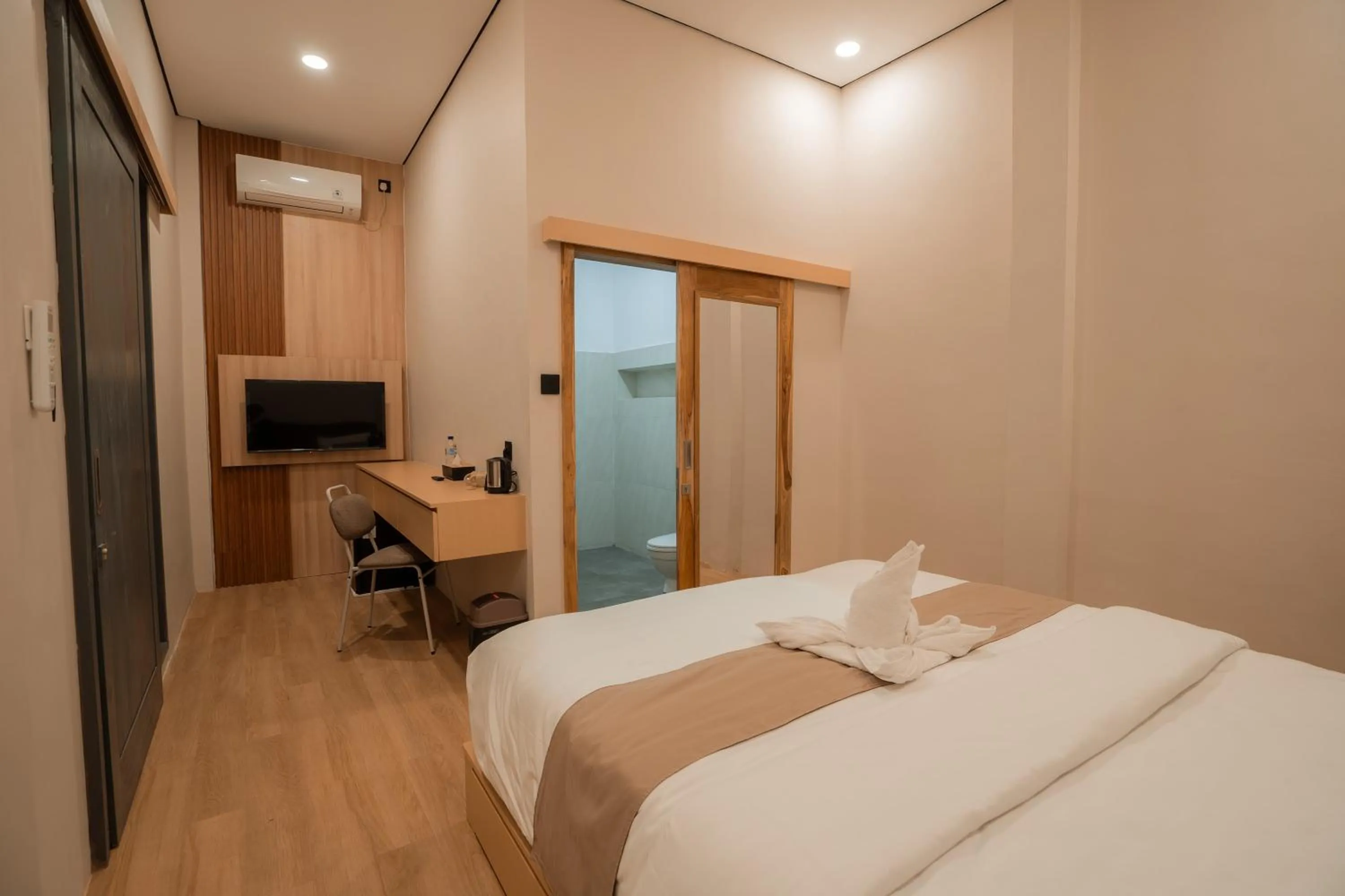 Bed in Yoki's Bungalows