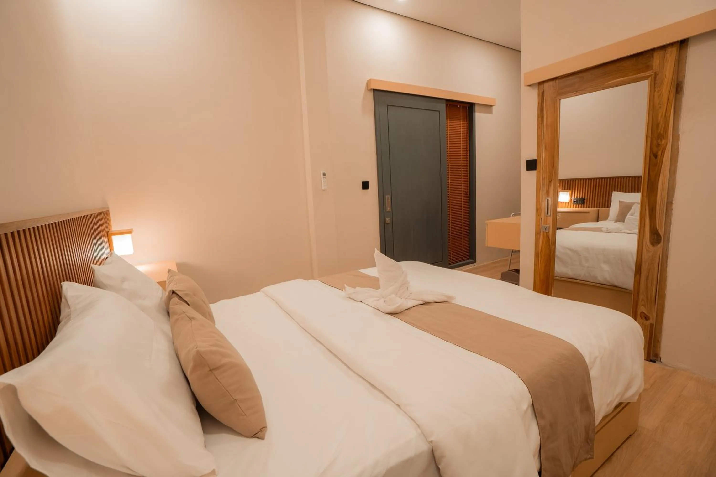 Bed in Yoki's Bungalows