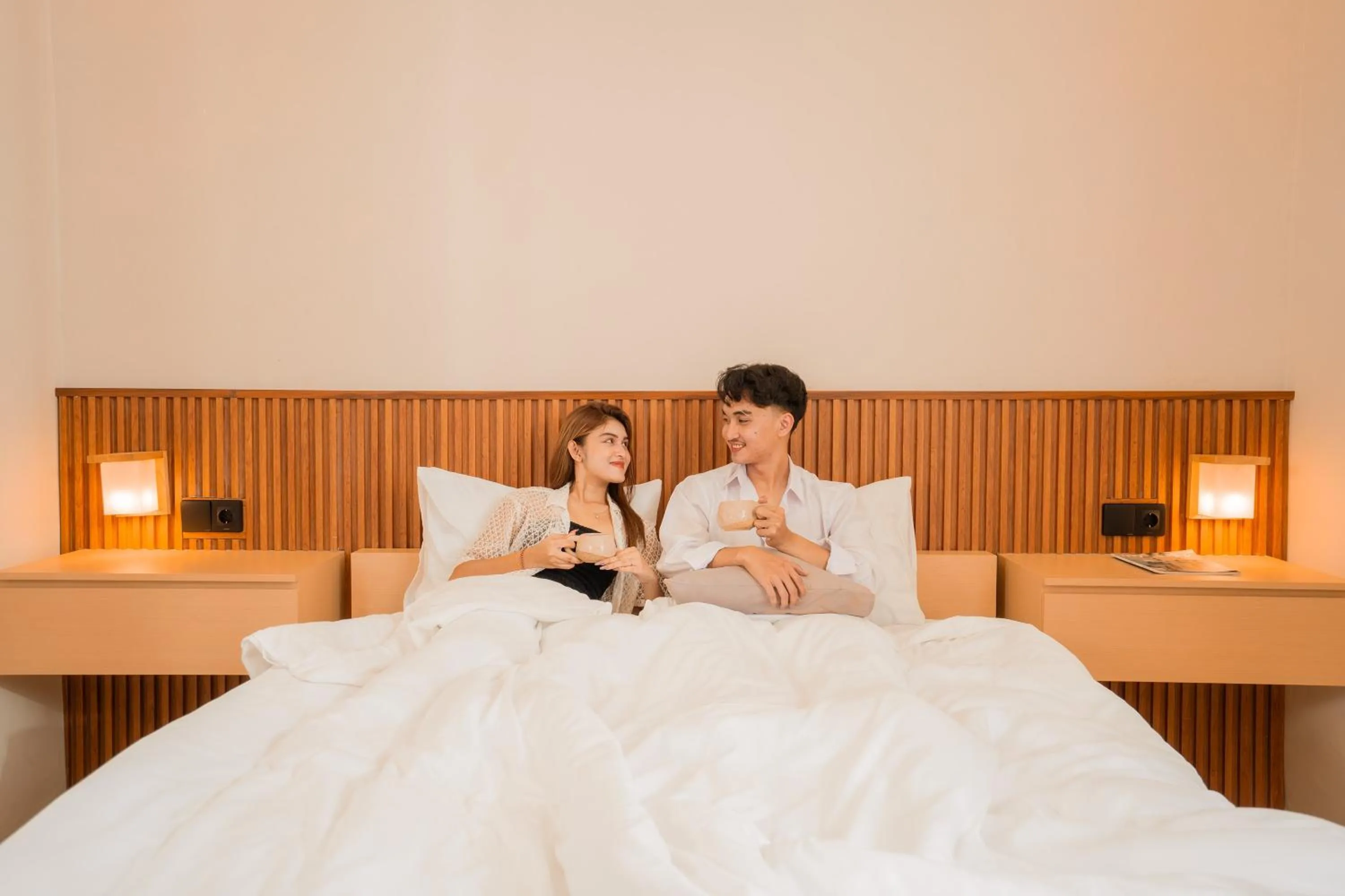 Bed in Yoki's Bungalows