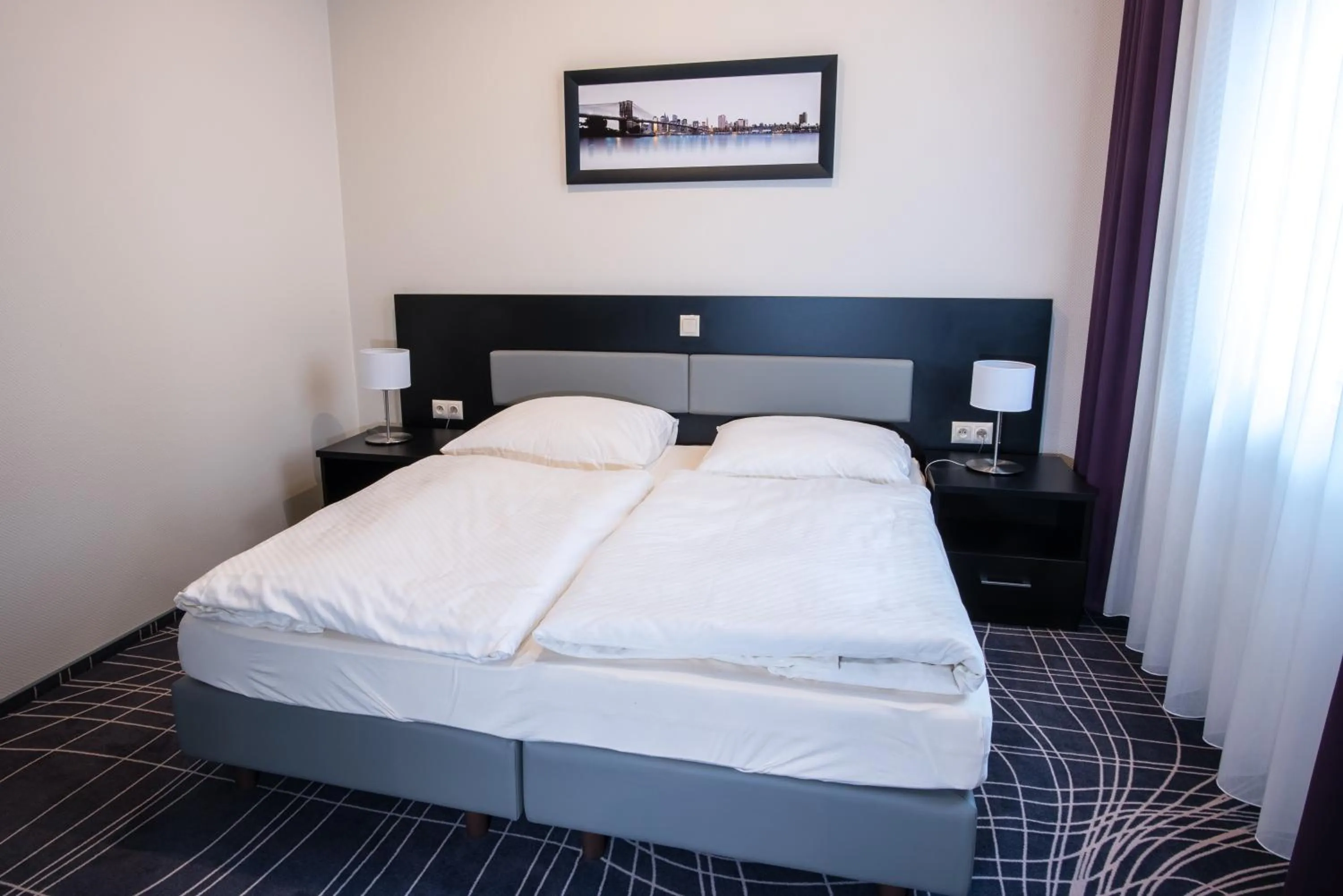 Bed in SkyHotelGwarna