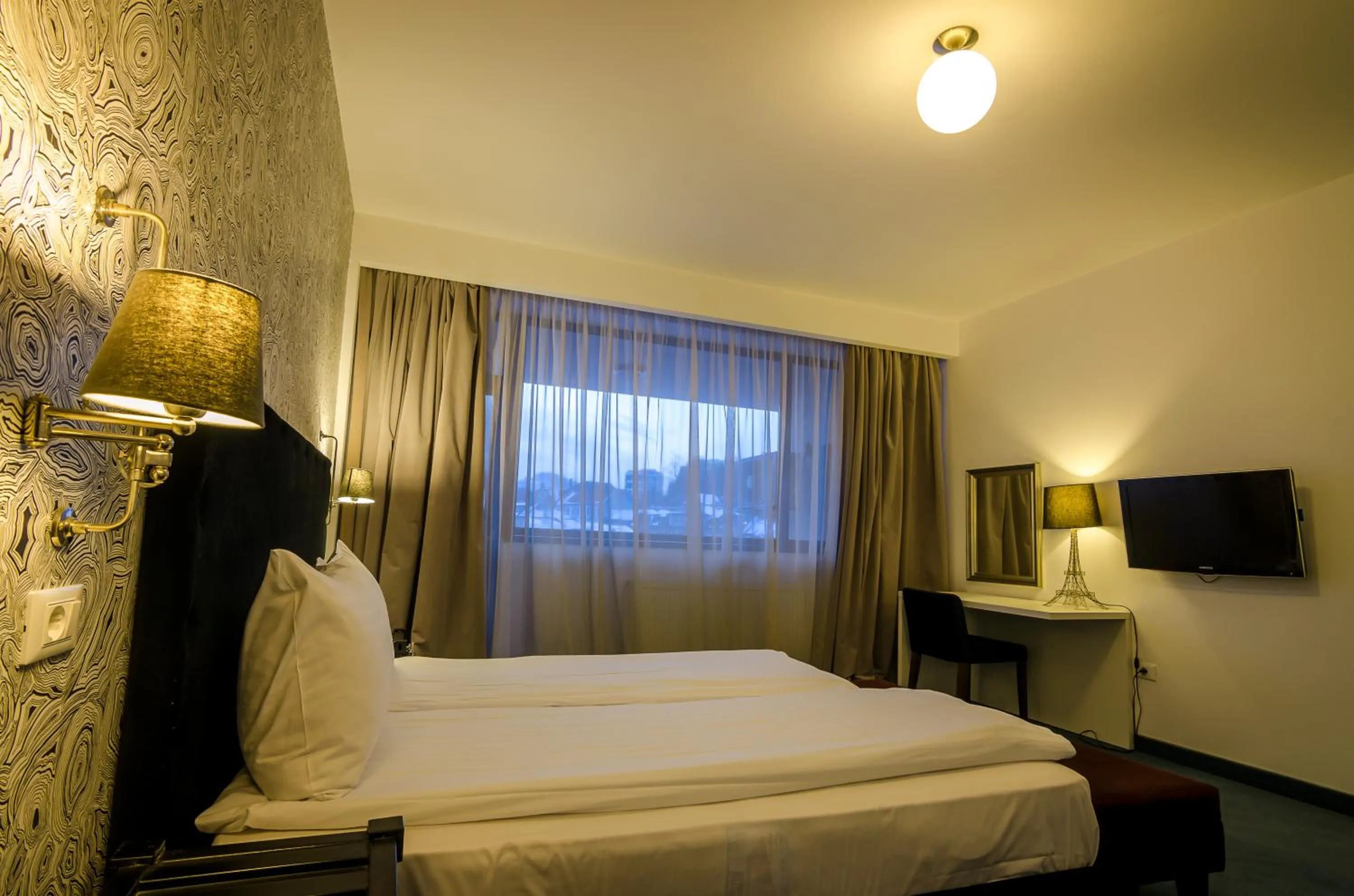 Bed in Apart Hotel Vlad Tepes