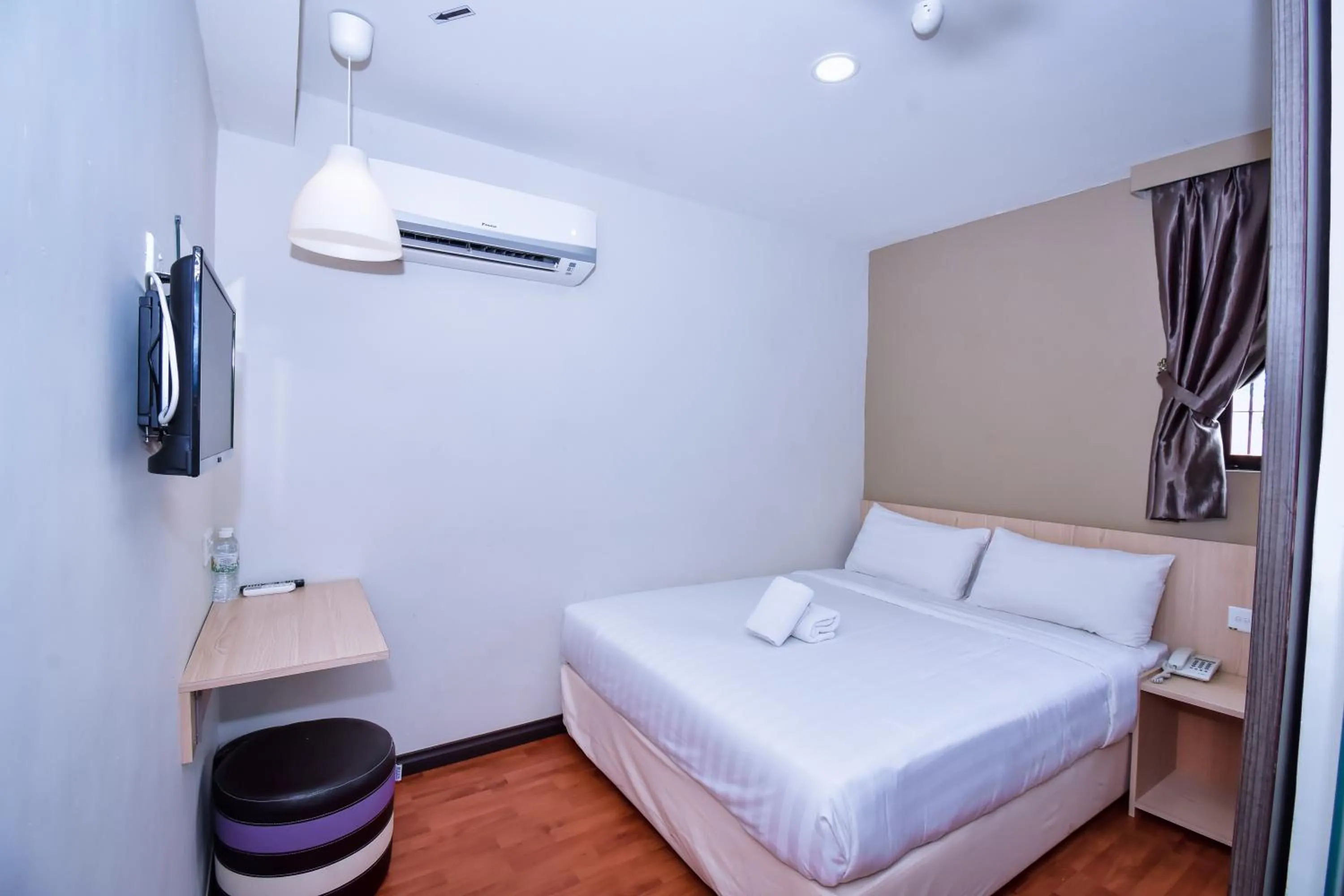 Bed in Eden Boutique Hotel