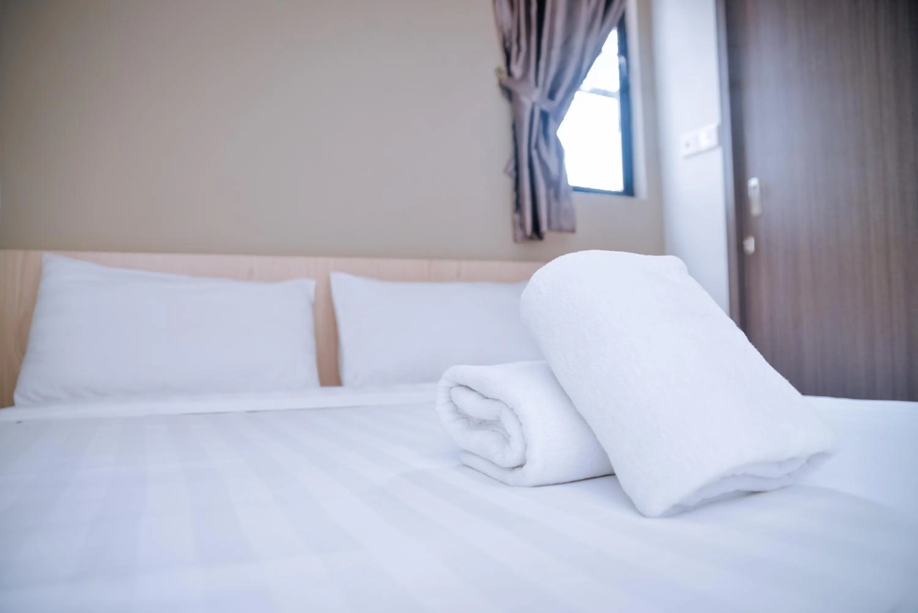 Bed in Eden Boutique Hotel