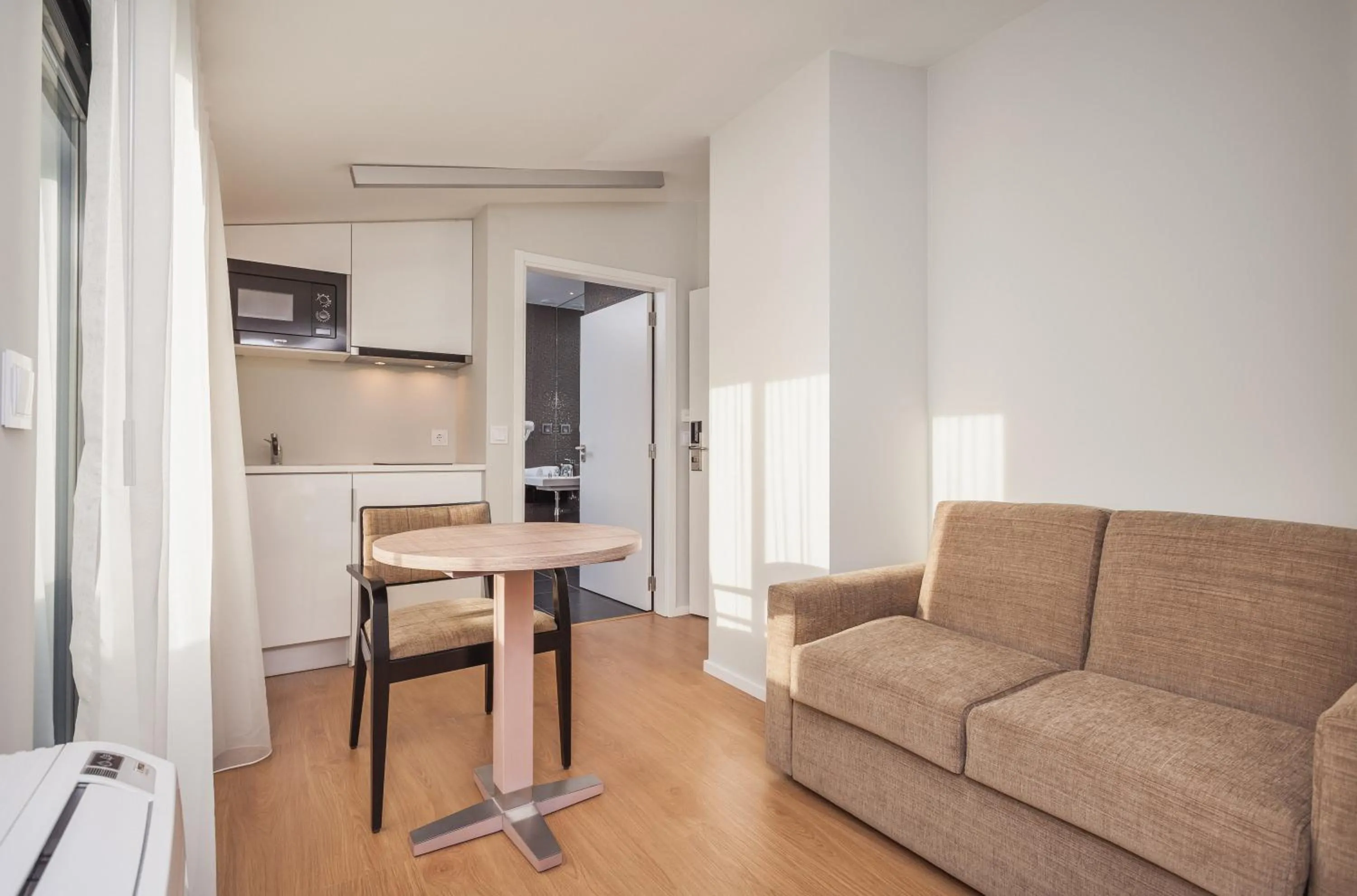 Kitchen or kitchenette in Essence Inn Marianos Hotel