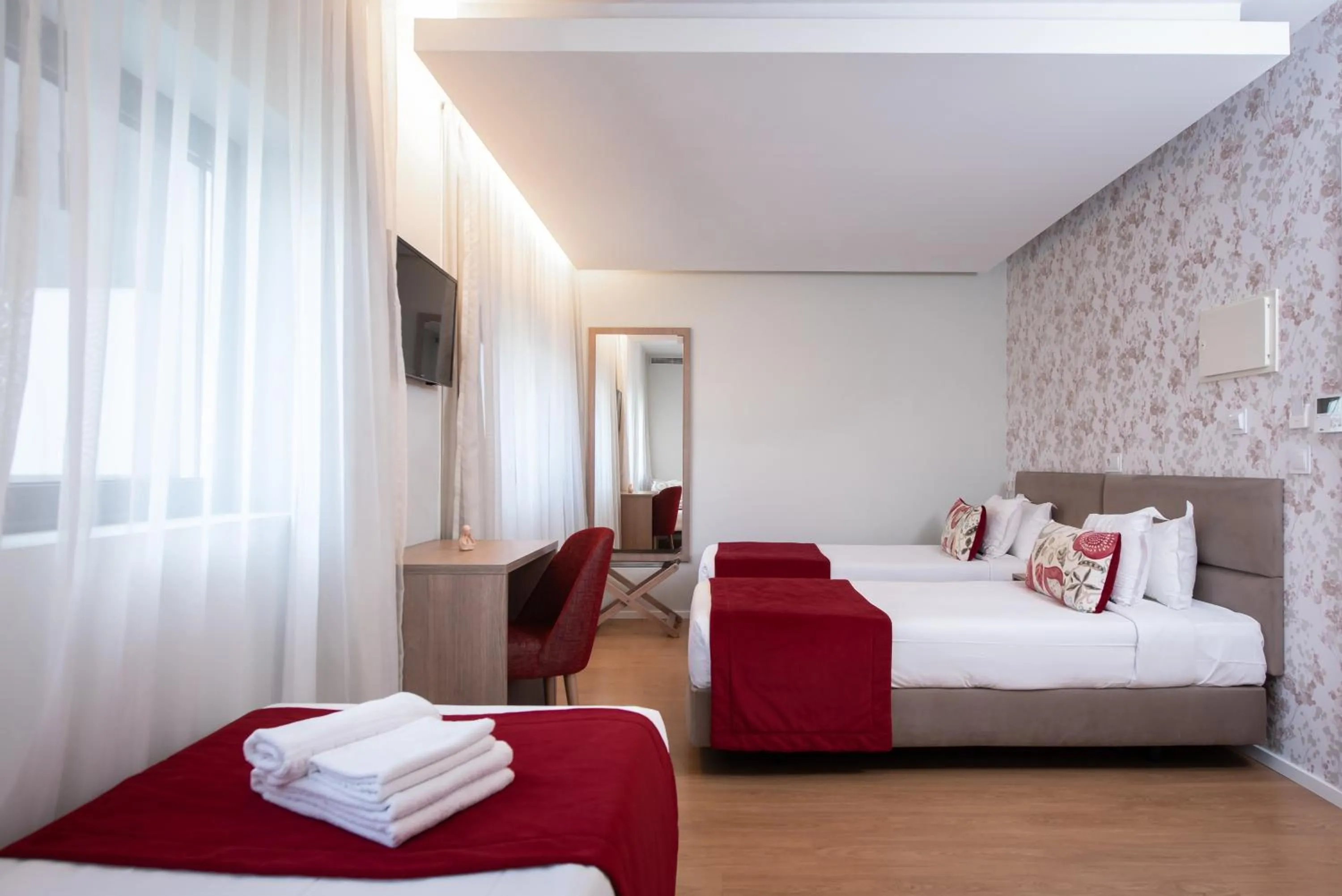 Bedroom, Bed in Essence Inn Marianos Hotel