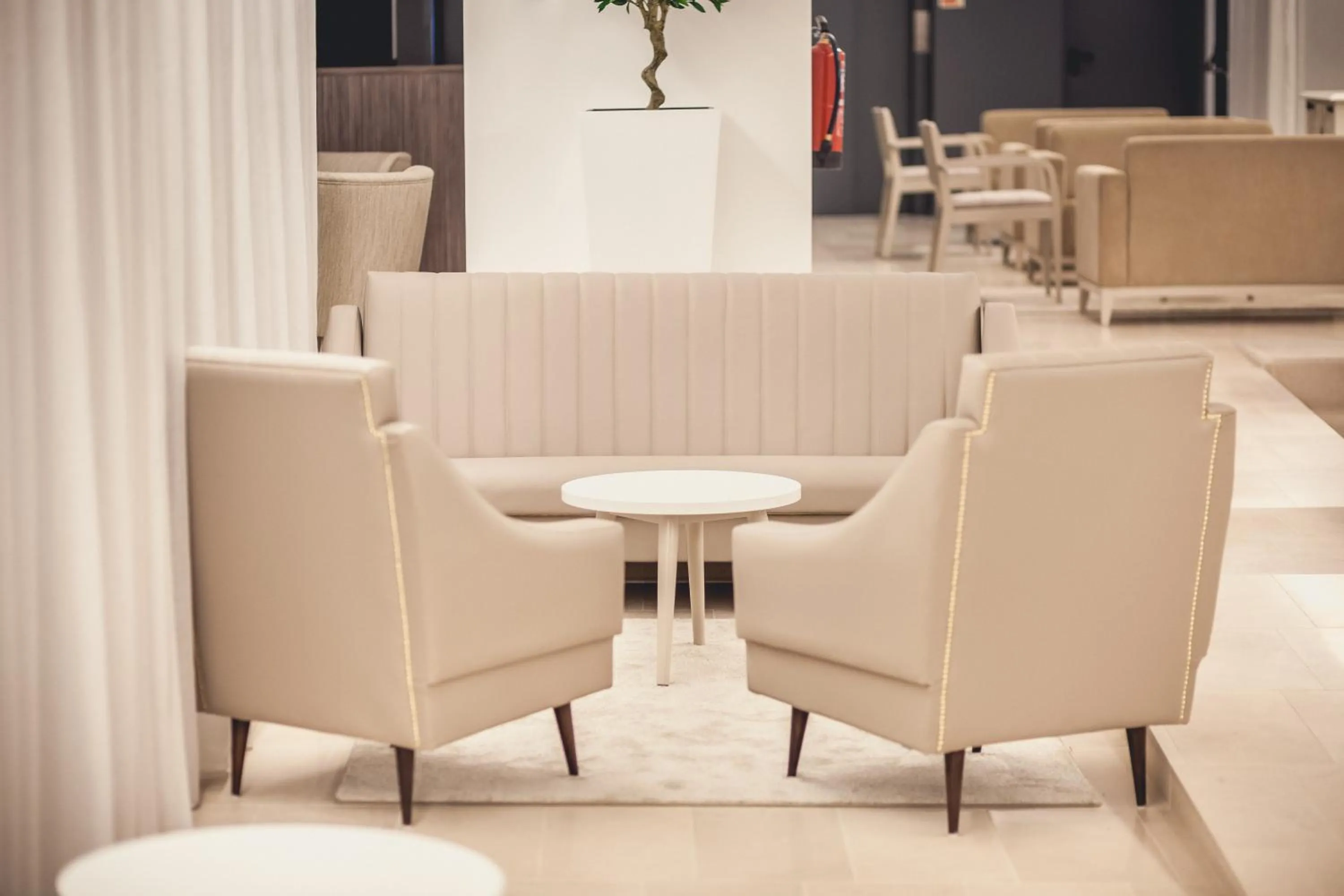 Living room in Essence Inn Marianos Hotel