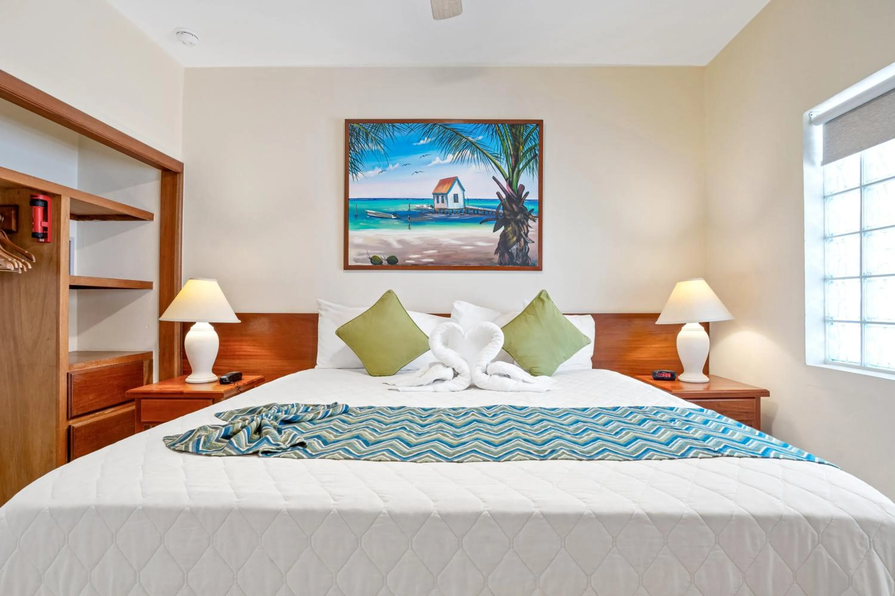 Bed in SunBreeze Suites