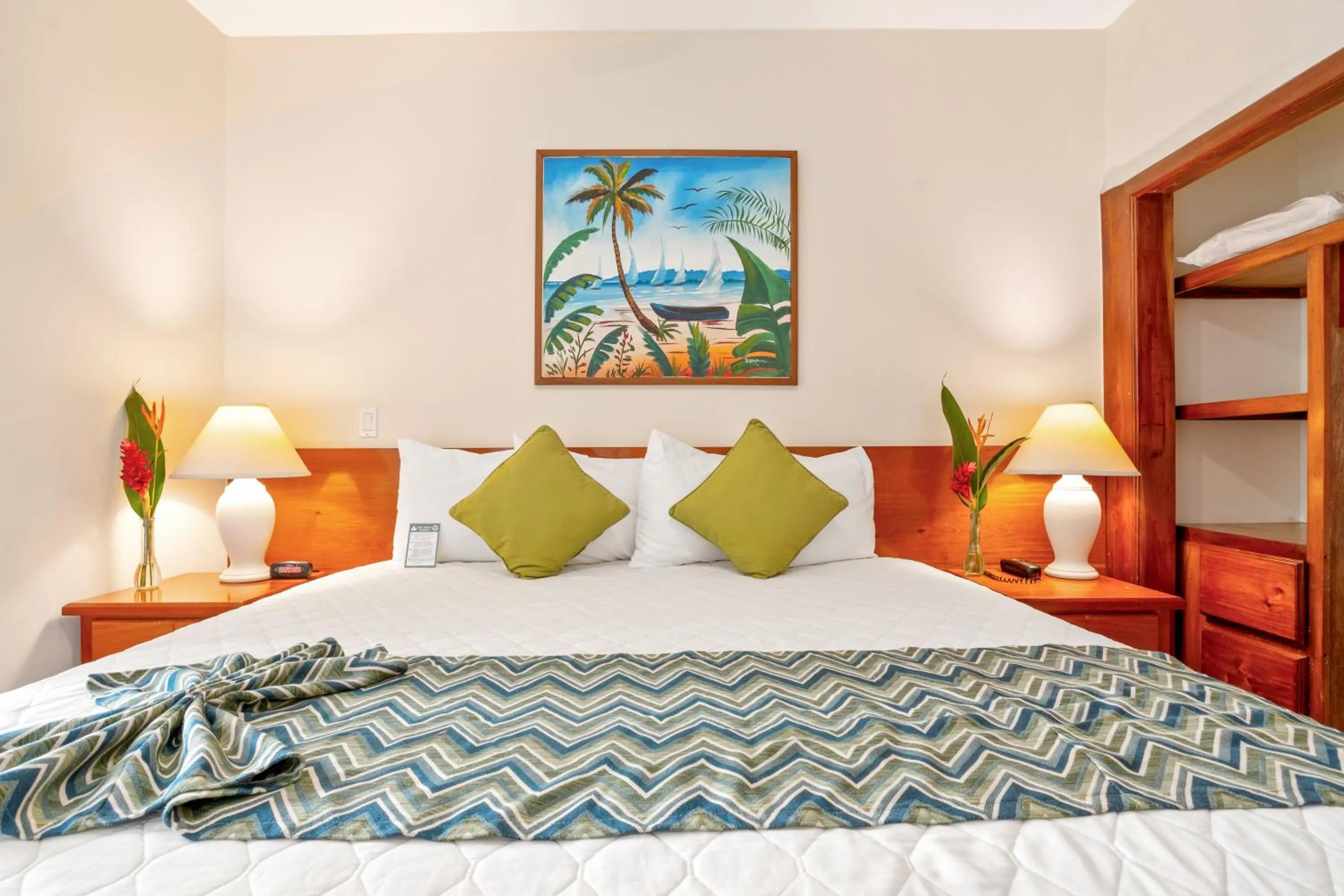 Bed in SunBreeze Suites