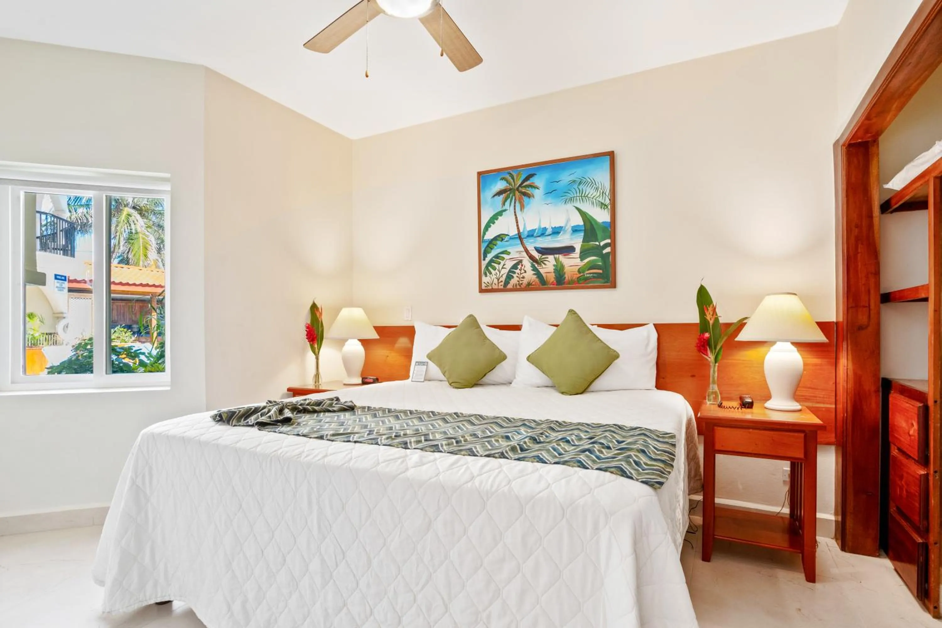 Bed in SunBreeze Suites