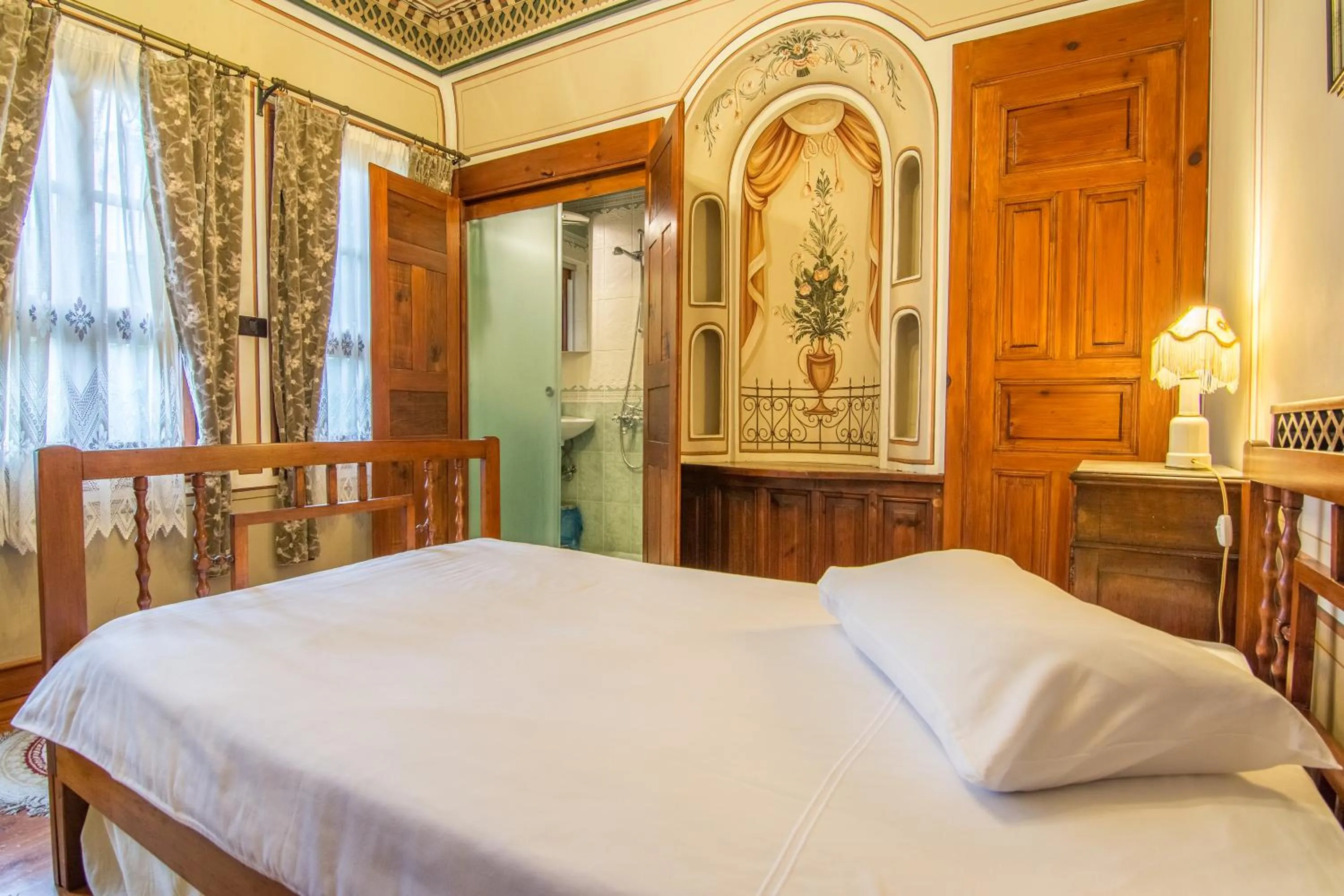 Bed in Old Legends Hotel