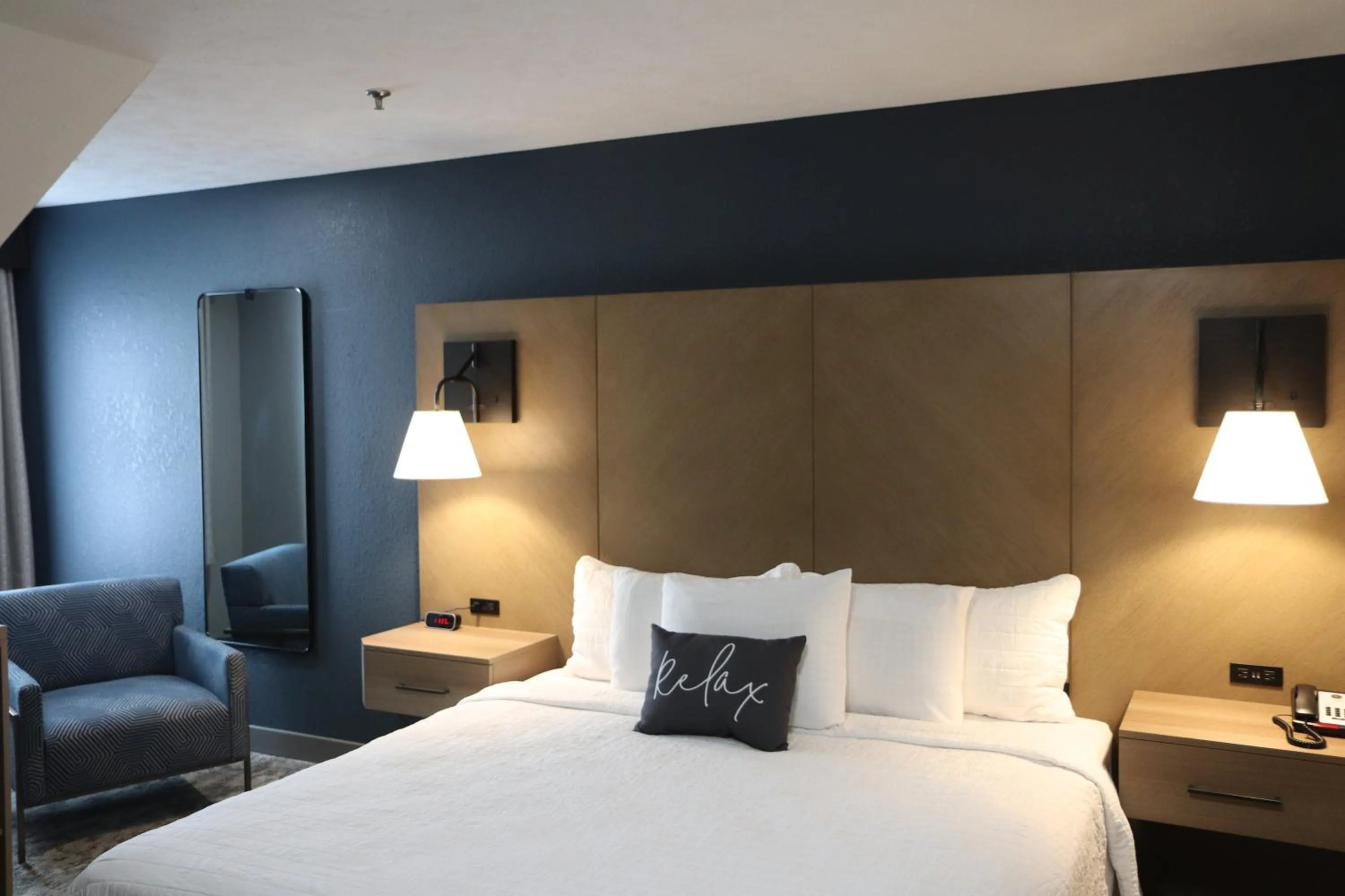 Bed in Eastland Suites Hotel & Conference Ctr, Trademark by Wyndham