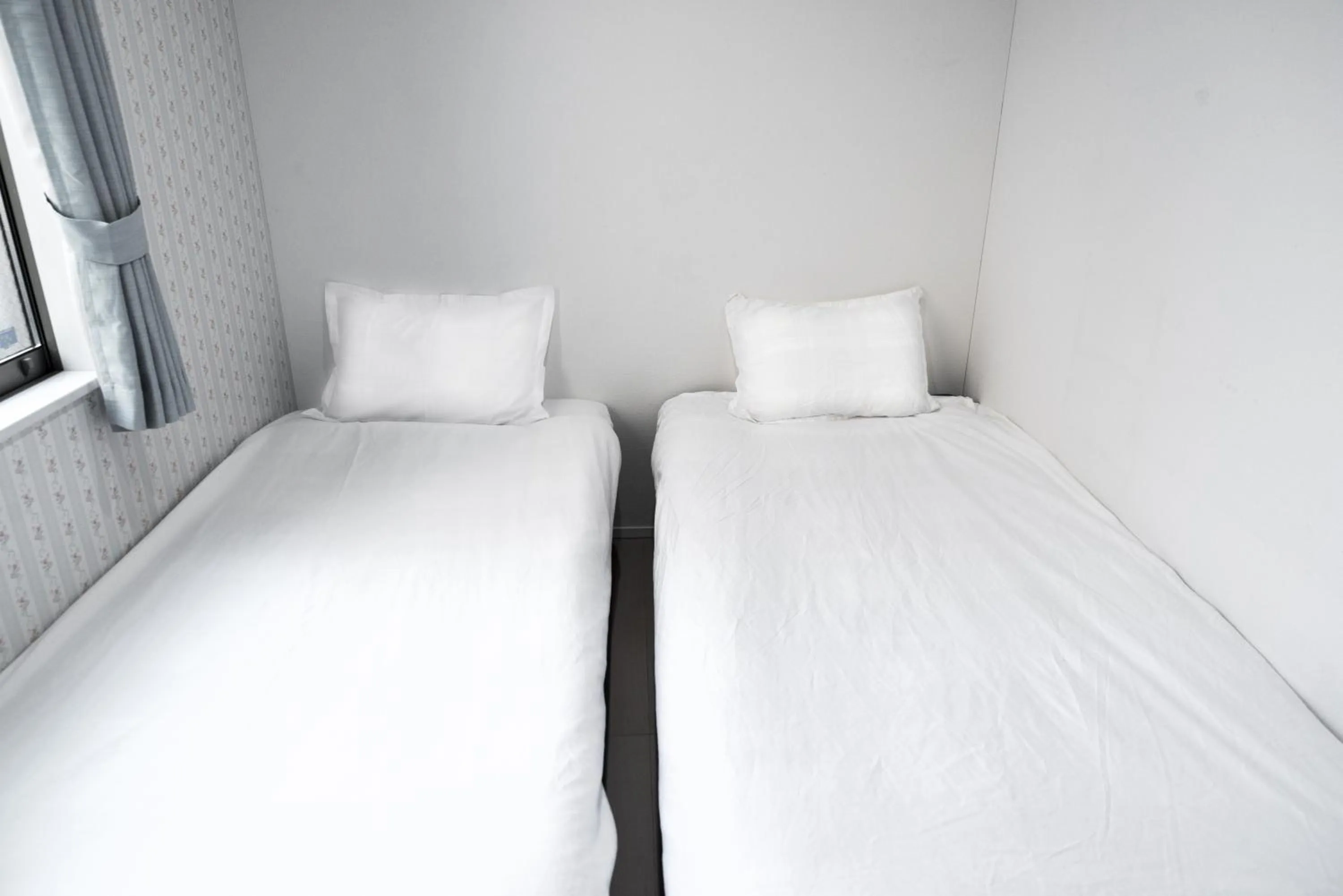 Bed in nestay inn tokyo senju