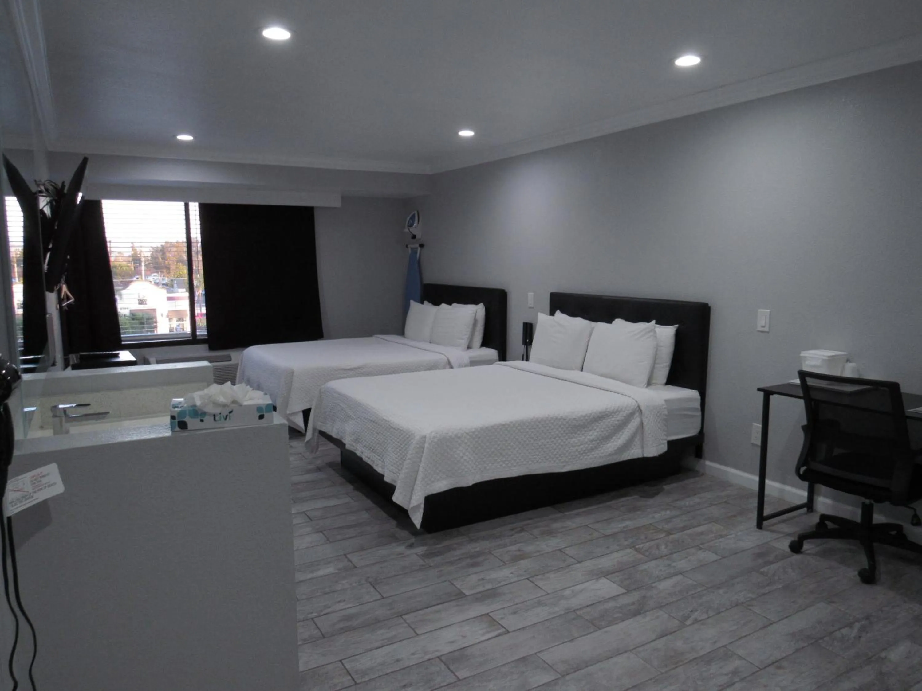 Bed in Capri Suites Anaheim