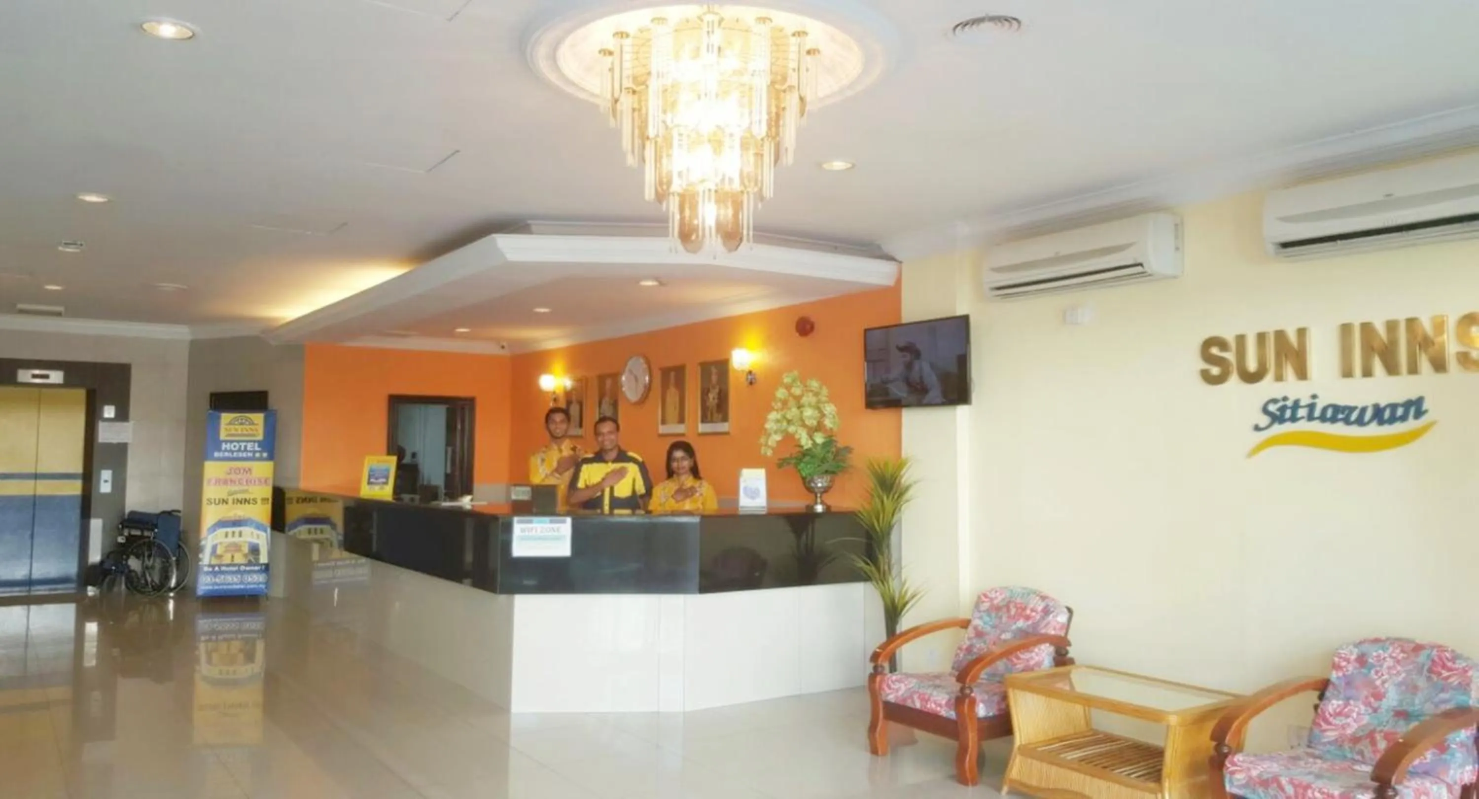 Staff in Sun Inns Hotel Sitiawan