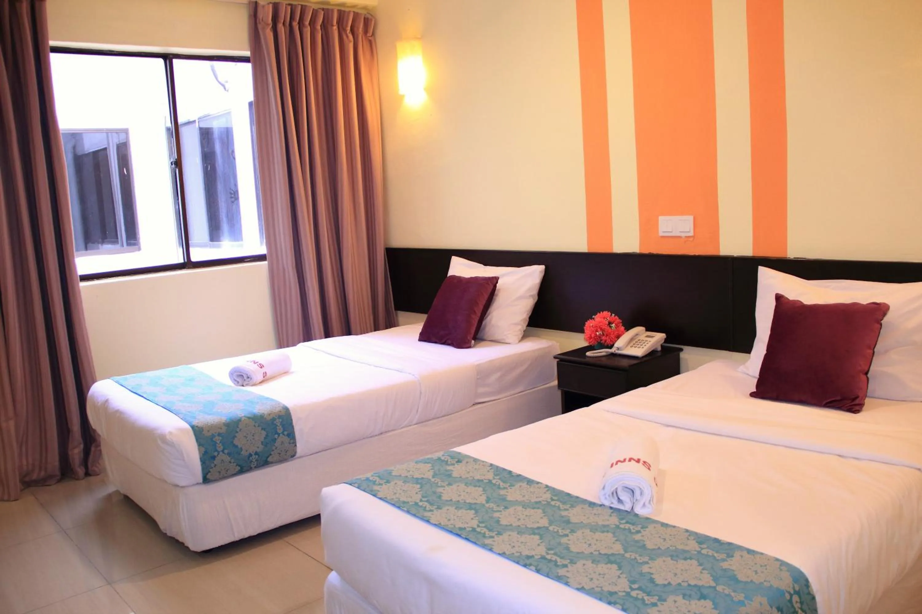 Bedroom, Bed in Sun Inns Hotel Sitiawan
