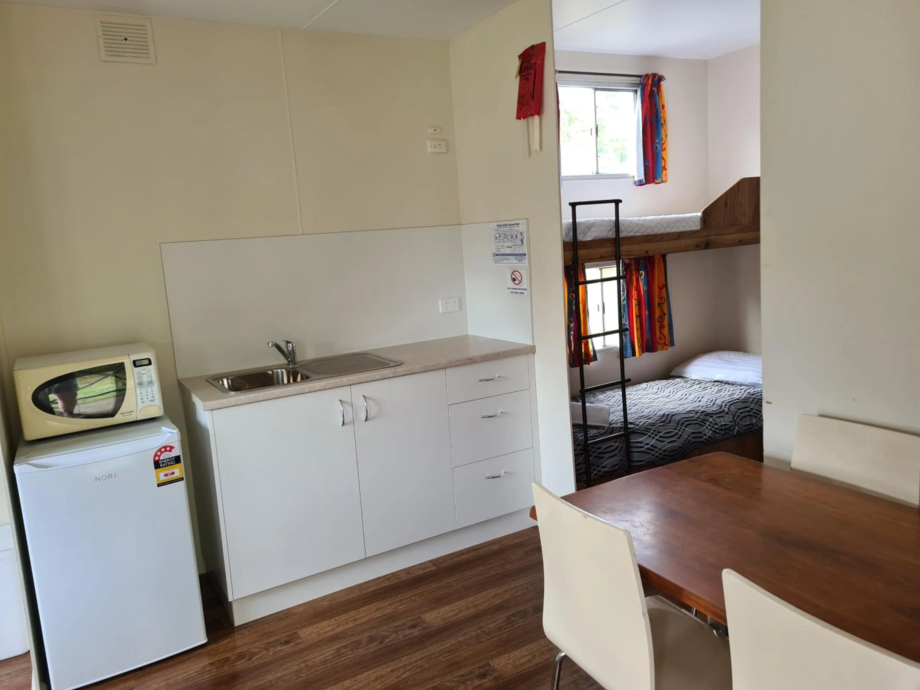 Living room in Mallacoota's Shady Gully Caravan Park