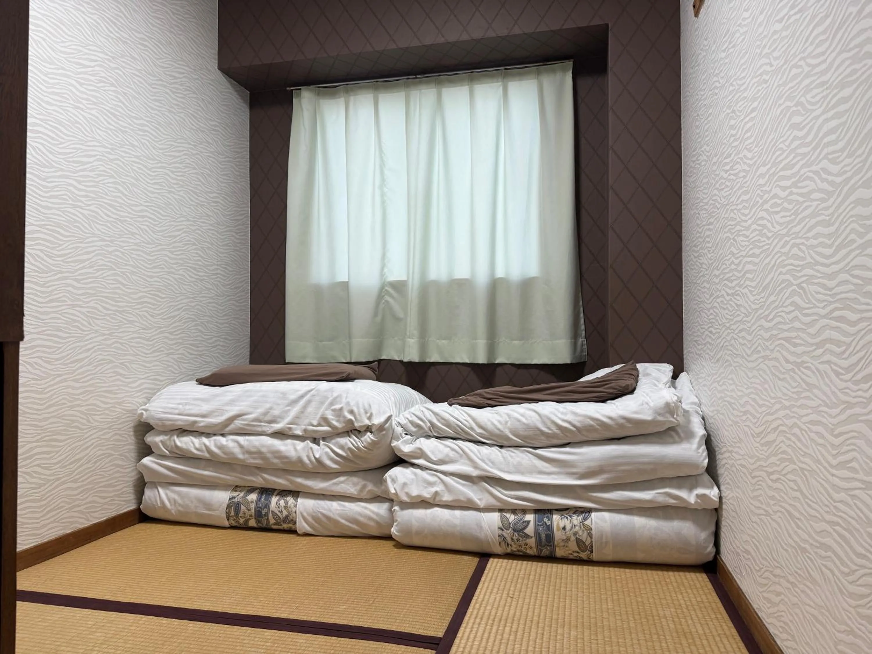Bed in Business Hotel Kaga