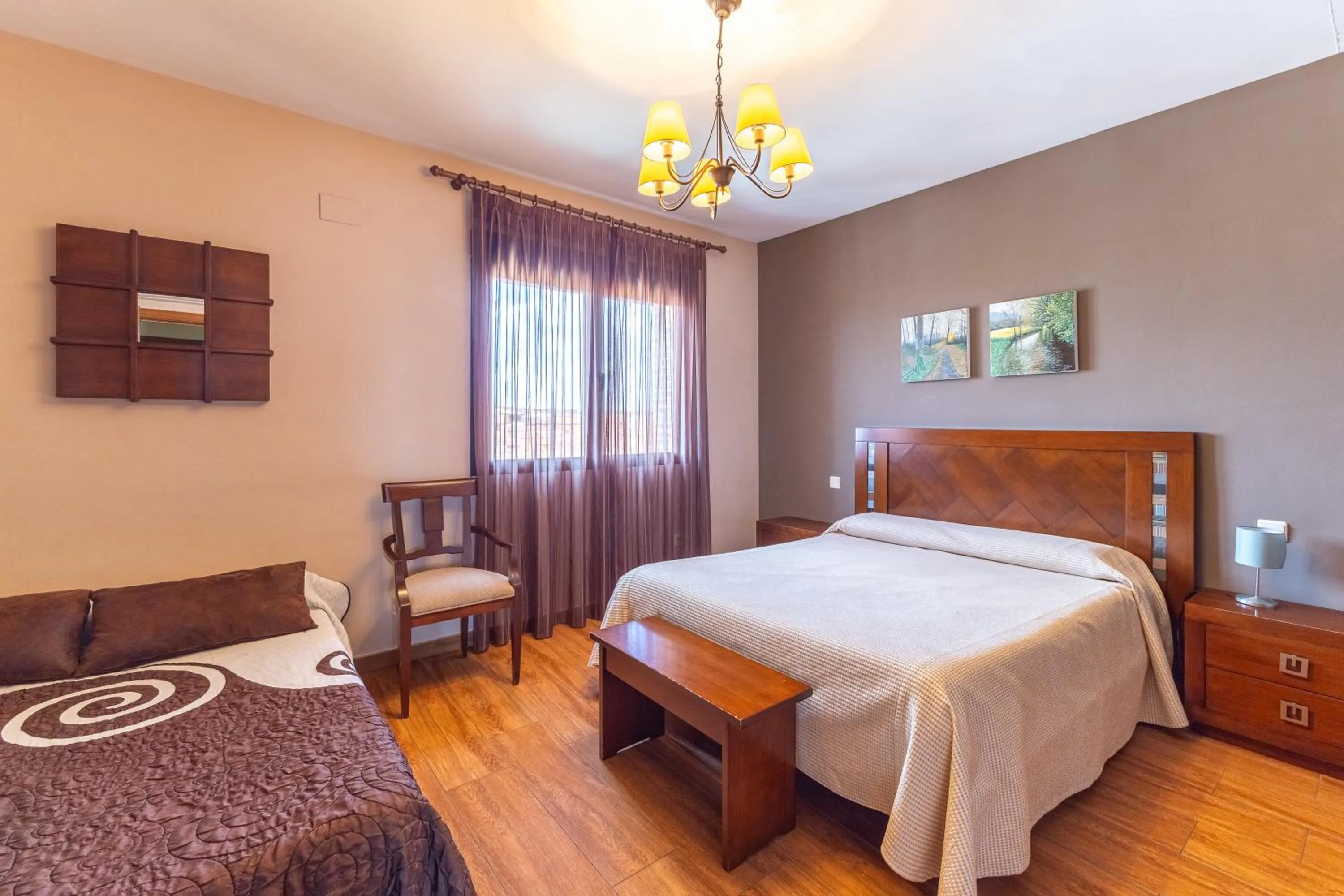 Bed in Alojamientos Callejón del Pozo, cerca Puy du Fou