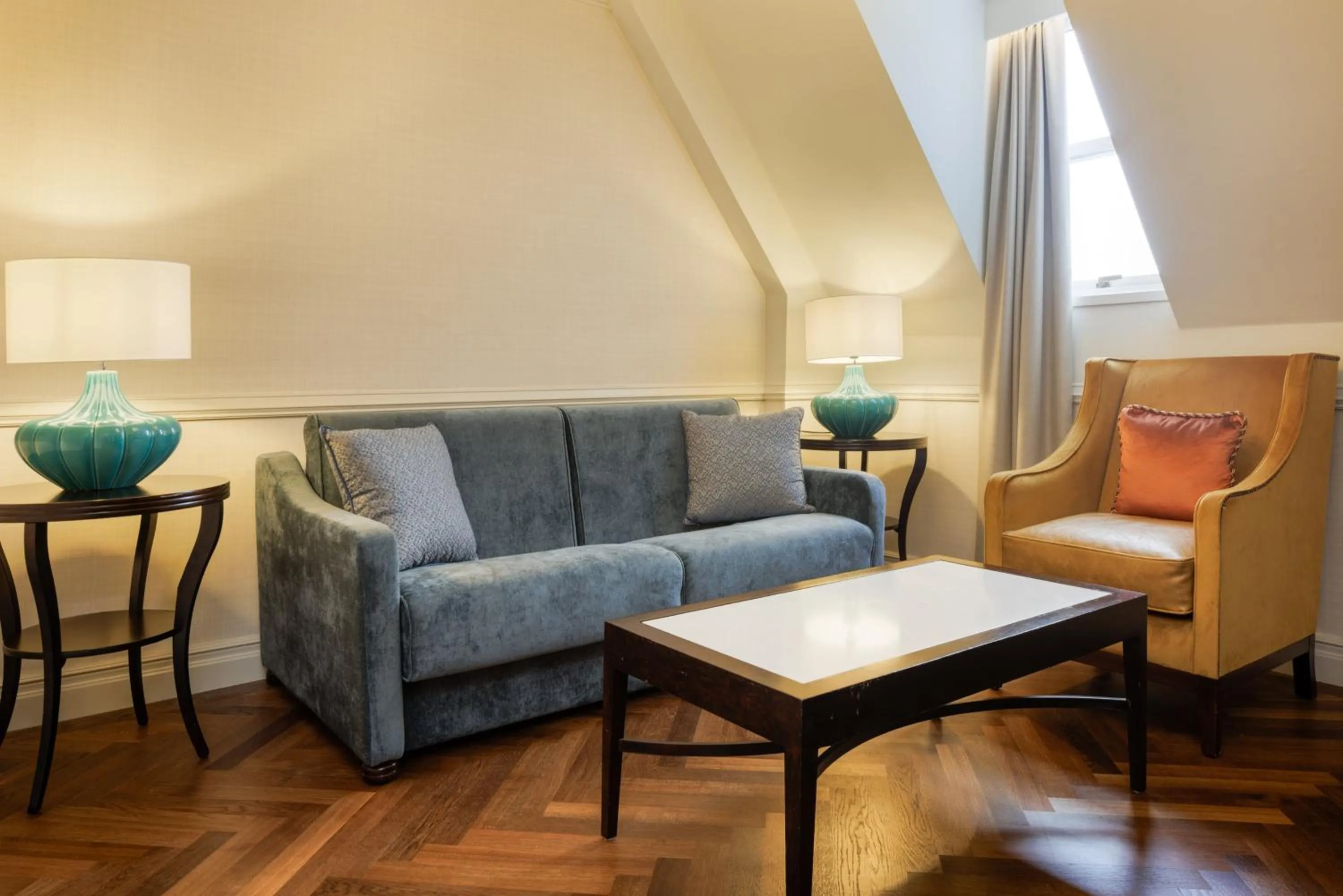 Living room in The Caledonian Edinburgh, Curio Collection by Hilton