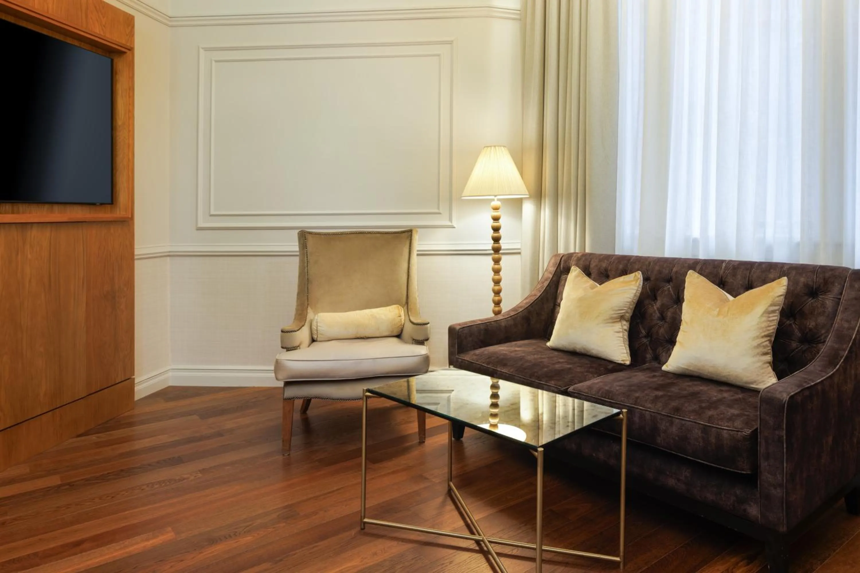 Living room in The Caledonian Edinburgh, Curio Collection by Hilton