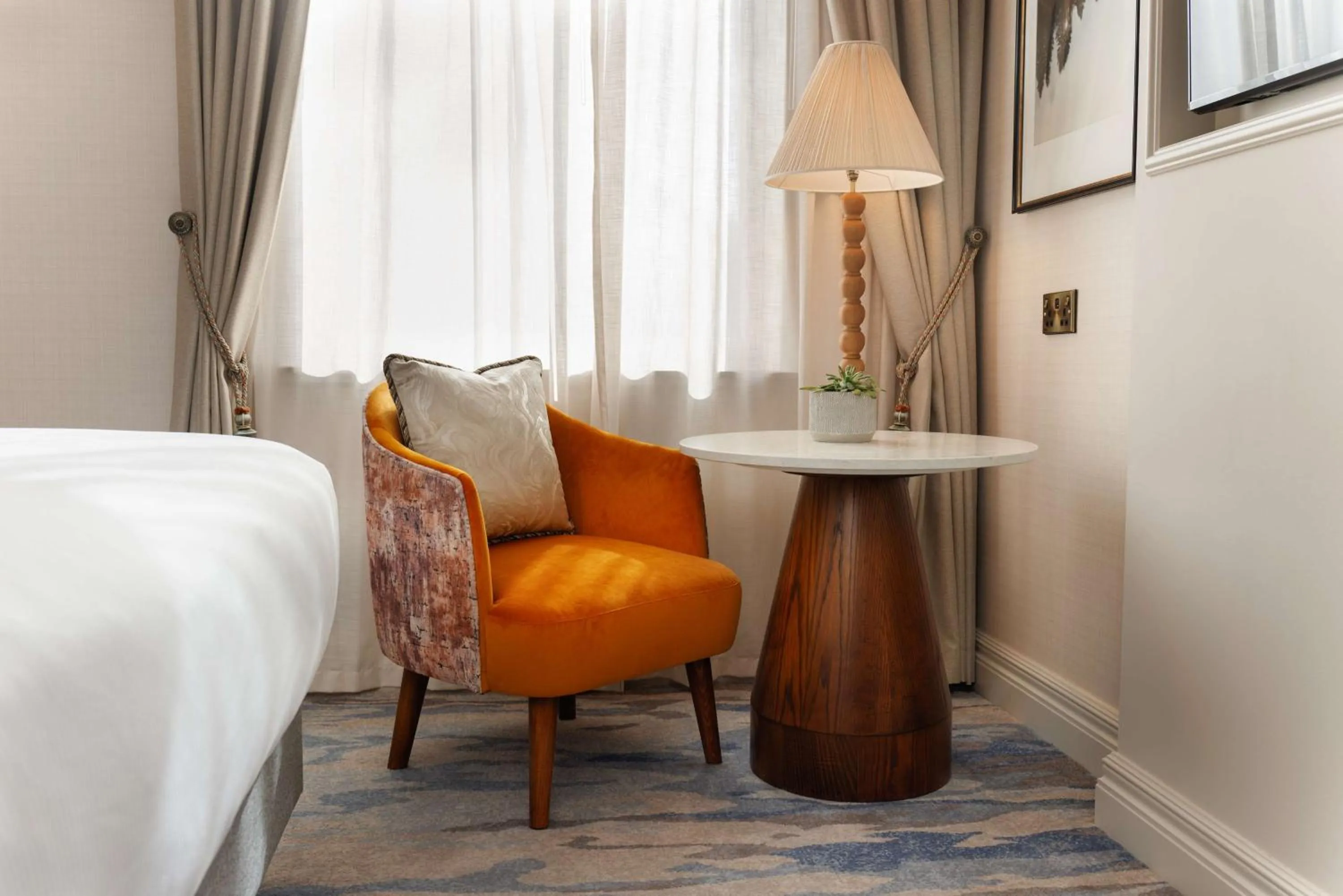 Seating area, Bed in The Caledonian Edinburgh, Curio Collection by Hilton