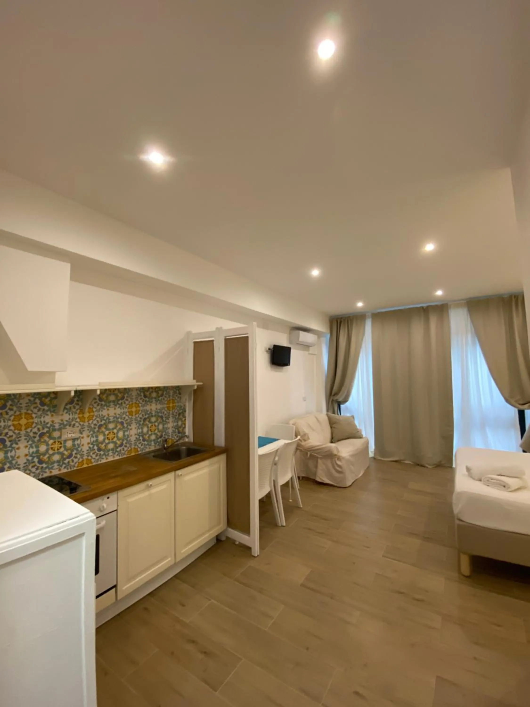 Kitchen or kitchenette, Bed in B&B Casa al Vicolo 2