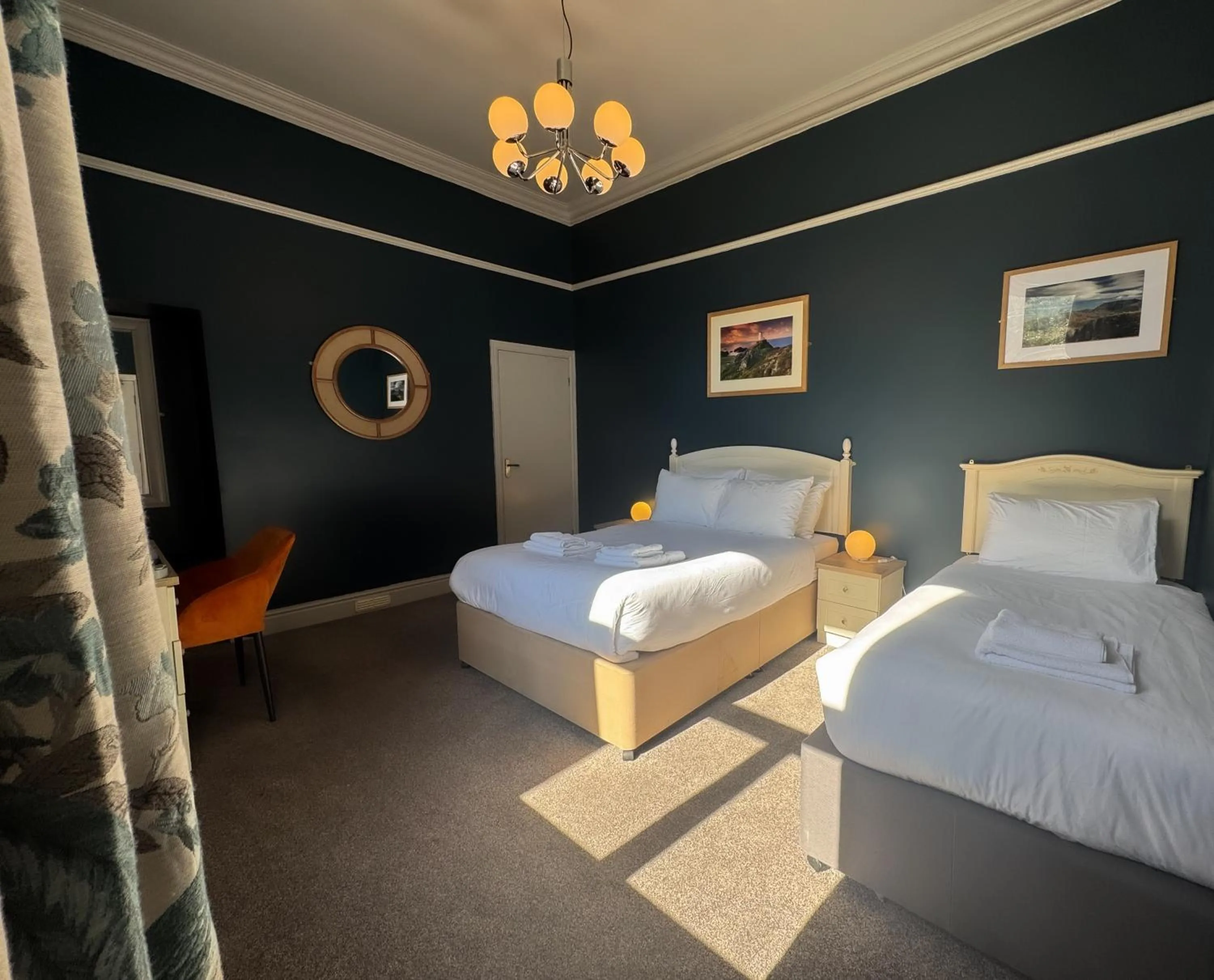 Bed in Nomi Rooms & Restaurant