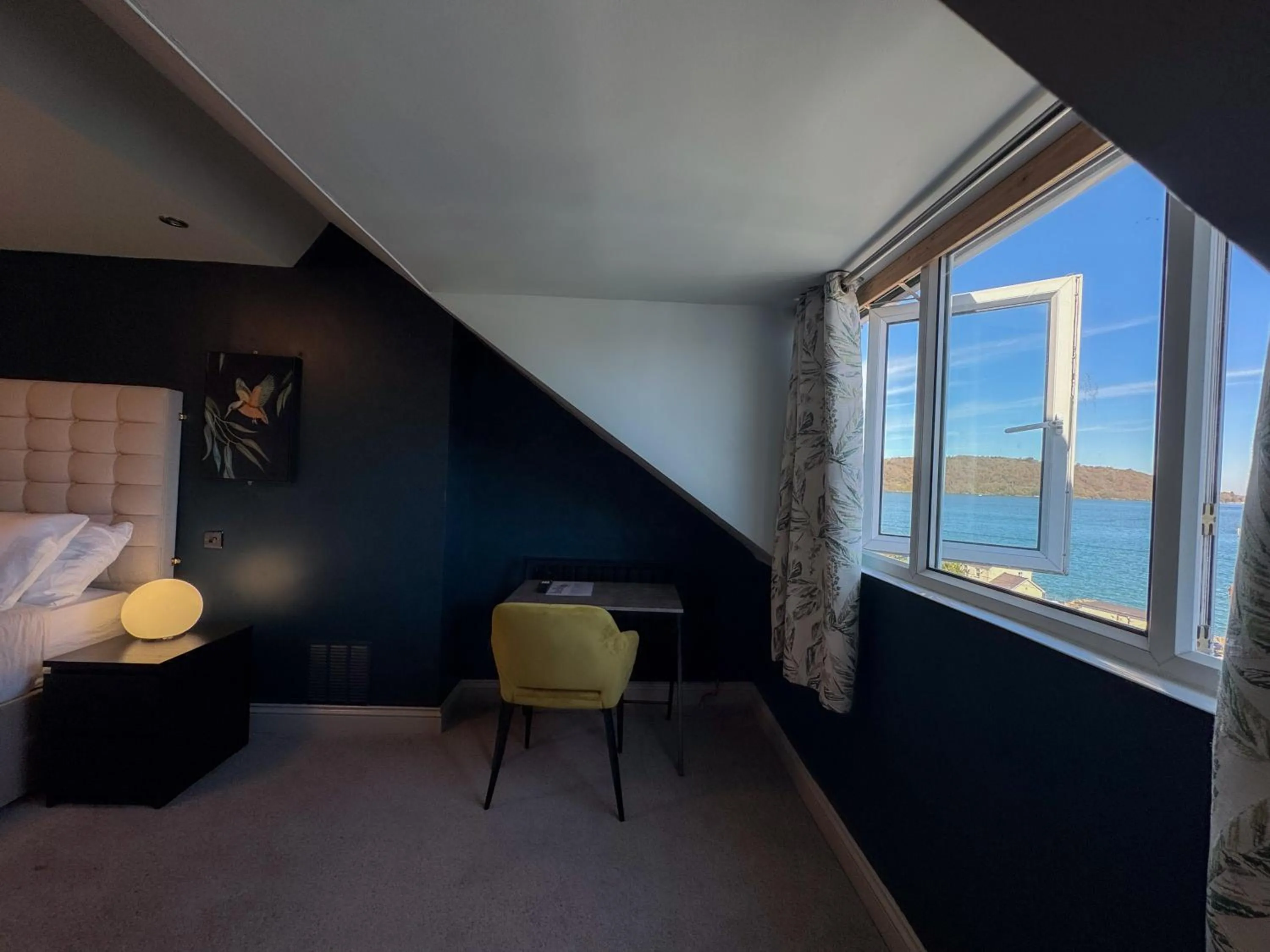 Bed in Nomi Rooms & Restaurant