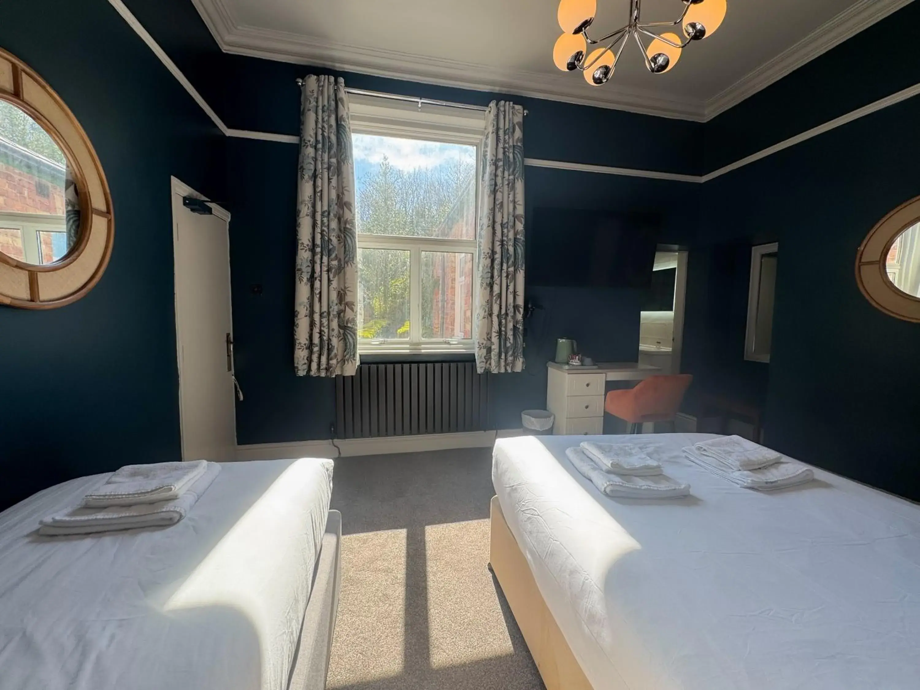 Family Room with Garden View in Nomi Rooms & Restaurant Family Room with Garden View in Nomi Rooms & Restaurant