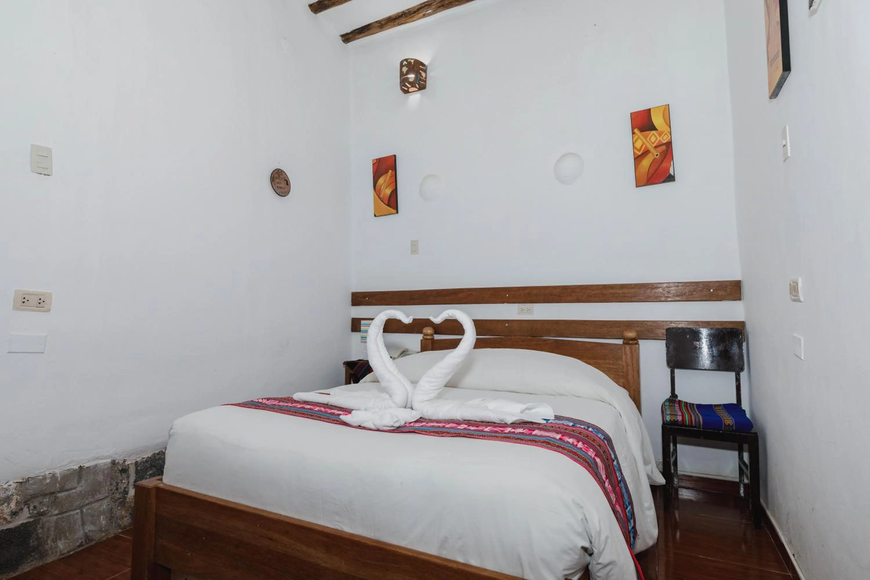 Bed in Hostal El Grial