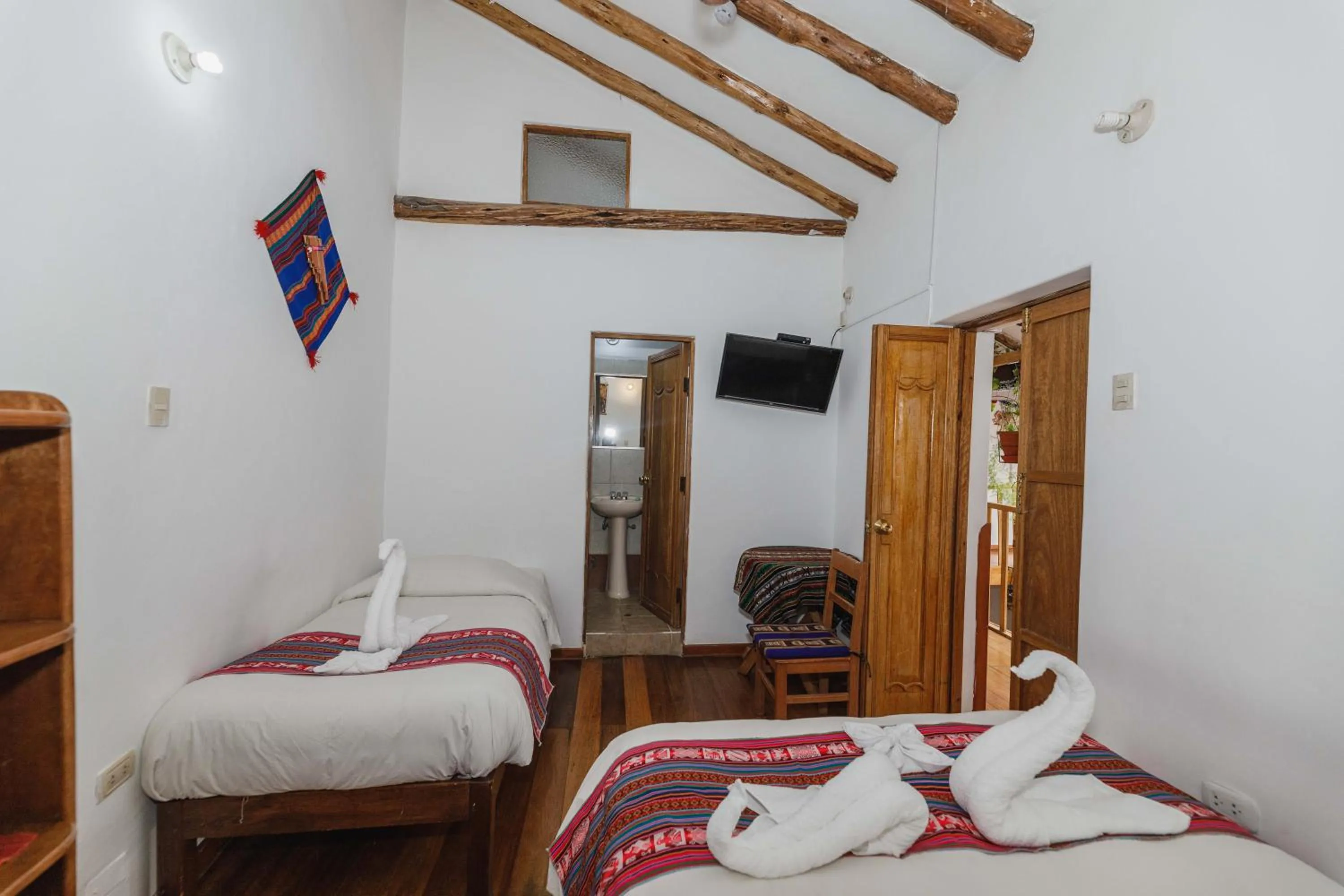 Bed in Hostal El Grial