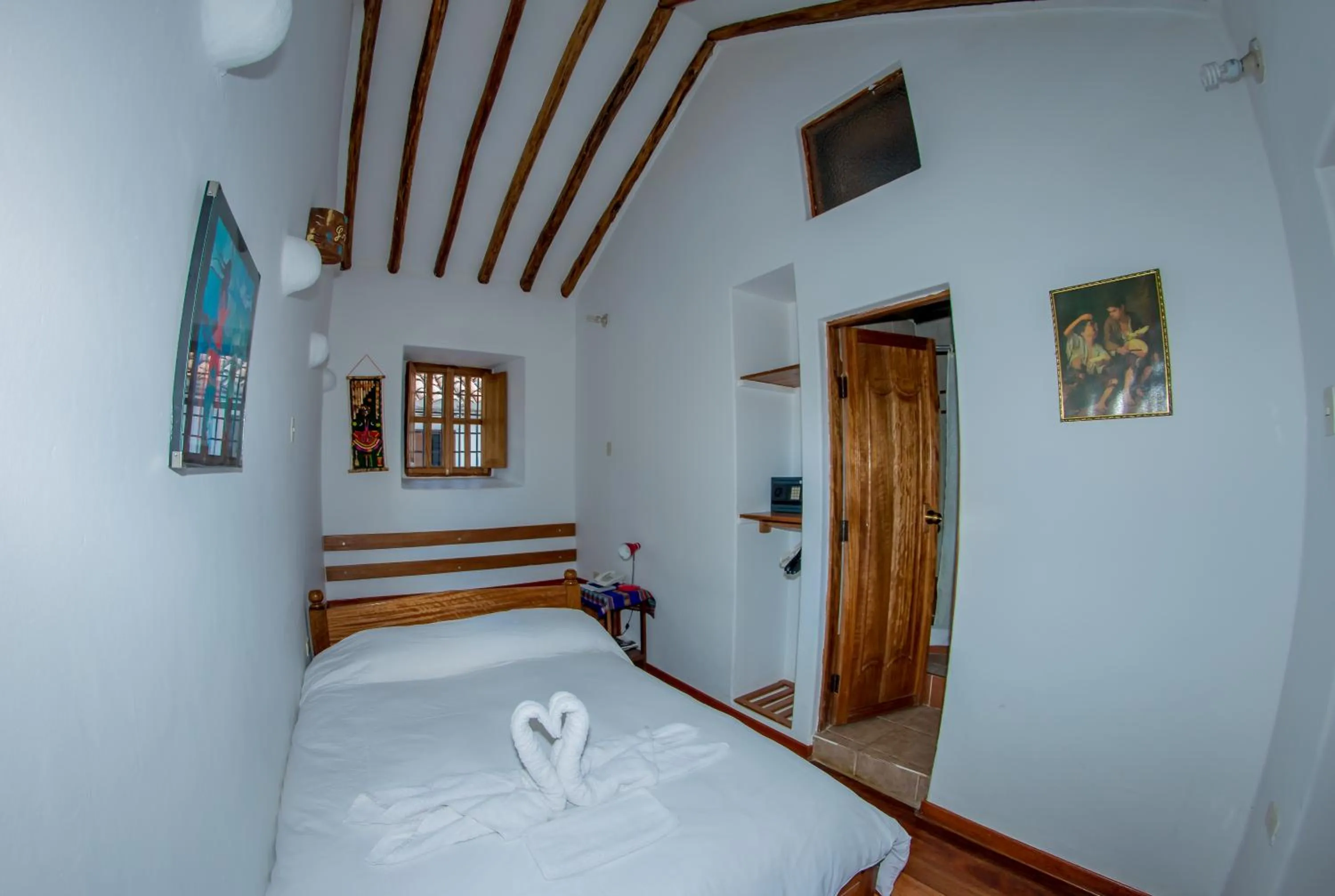 Photo of the whole room, Bed in Hostal El Grial