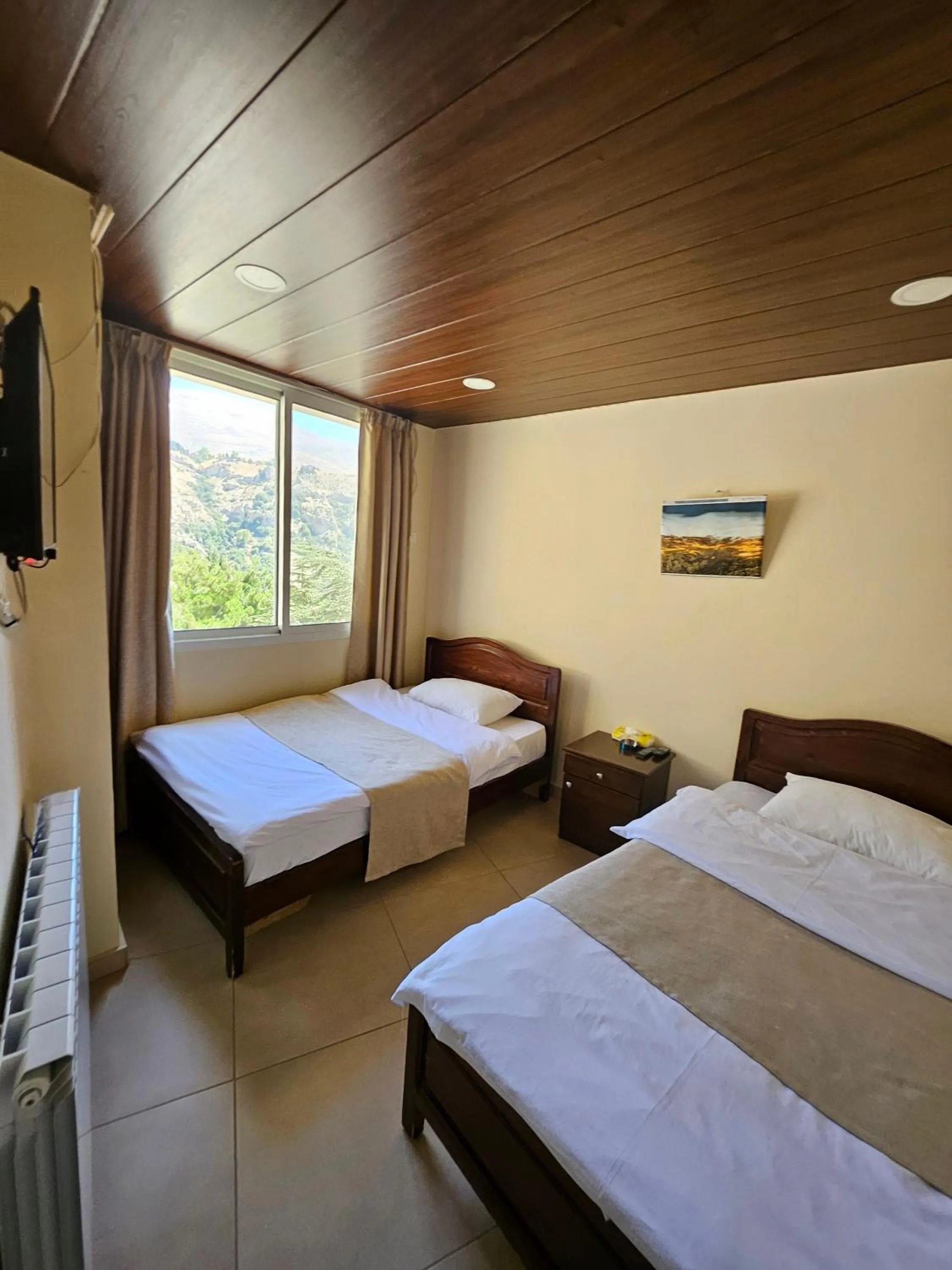 Bed in Hotel L'Aiglon